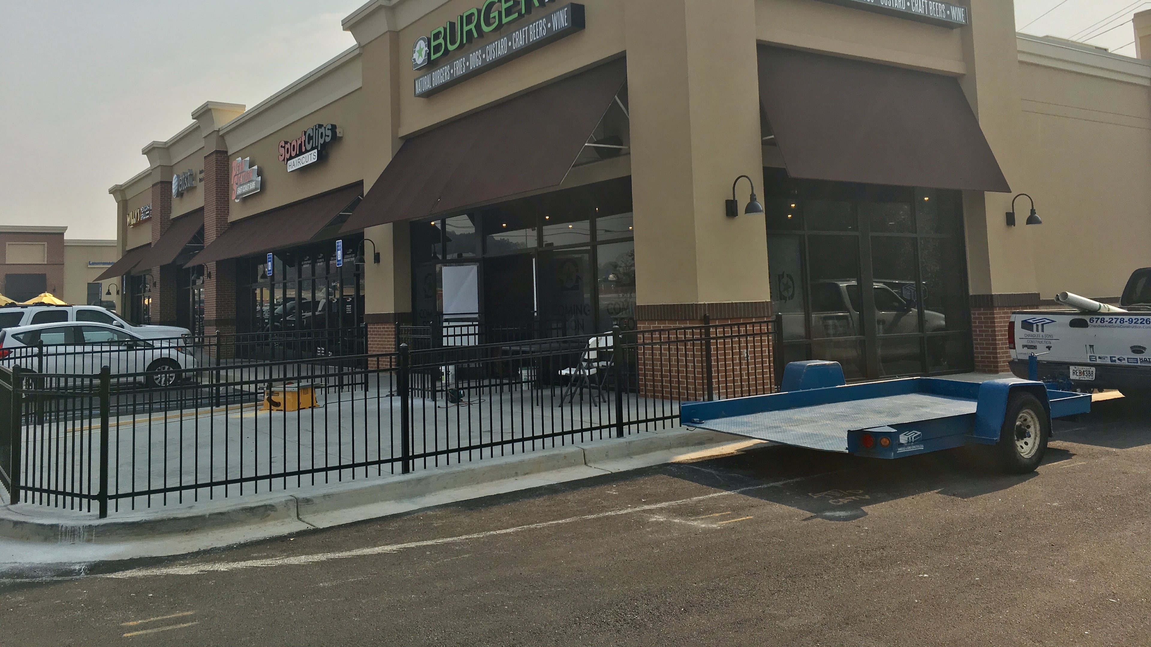 Construction is well underway at a new BurgerFi location on Duluth Highway near Lawrenceville. TYLER ESTEP /TYLER.ESTEP@AJC.COM