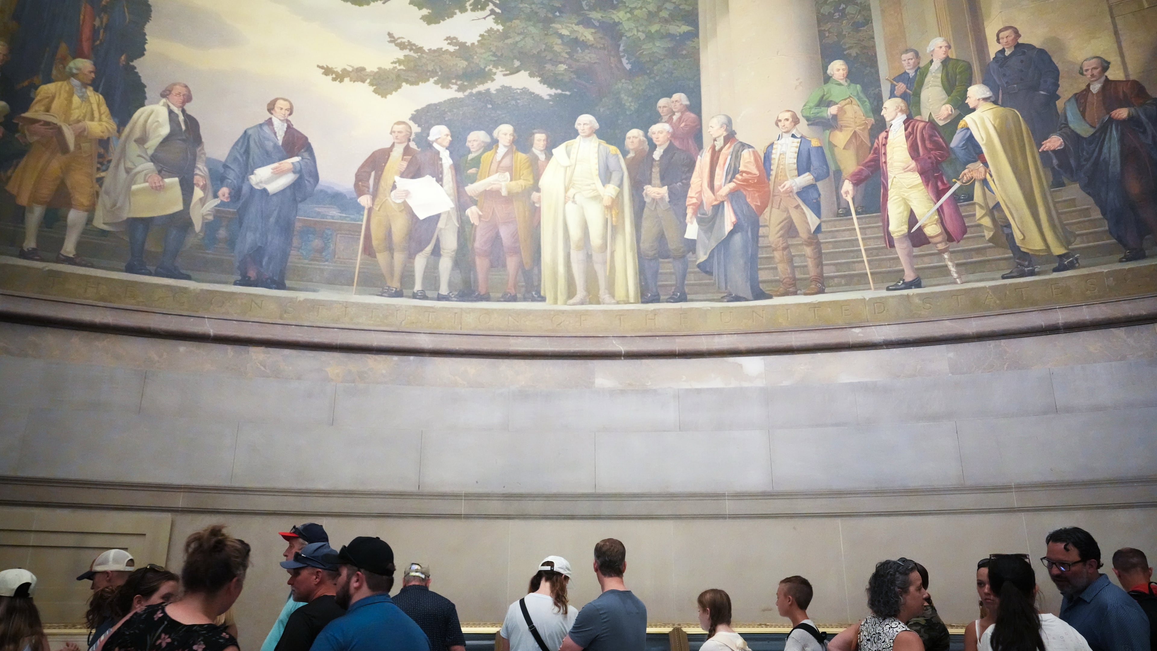People wait to look at the original Declaration of Independence and U.S. Constitution at the National Archives Museum, Friday, July 3, 2026, in Washington. (Julia Demaree Nikhinson/AP)