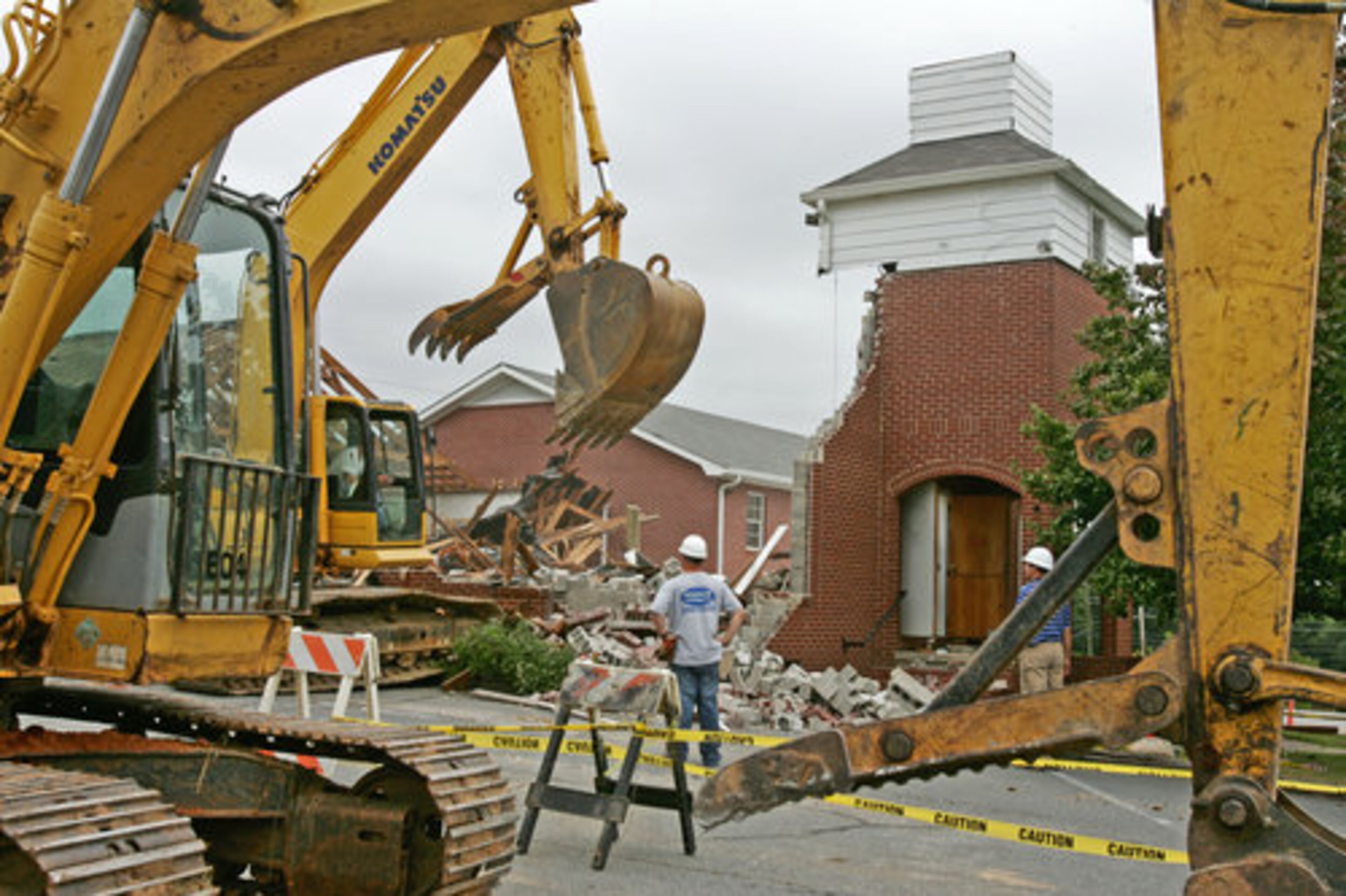 Workers from Mangum Construction Co. used two backhoes to demolish the sanctuary.
