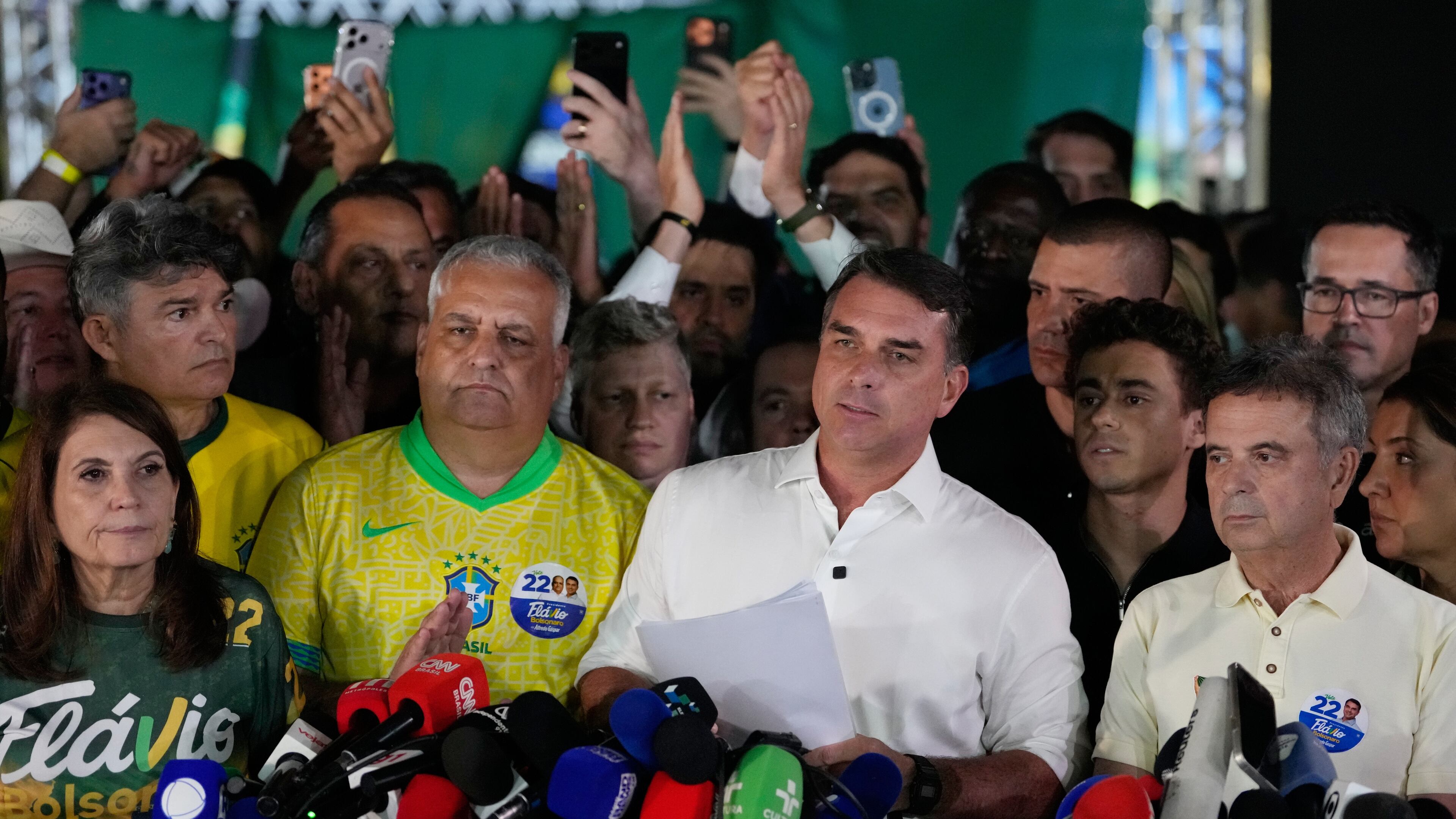 Opposition presidential candidate Sen. Flavio Bolsonaro speaks after the presidential runoff in Brasilia, Brazil, Sunday, Oct. 25, 2026. (AP Photo/Eraldo Peres)