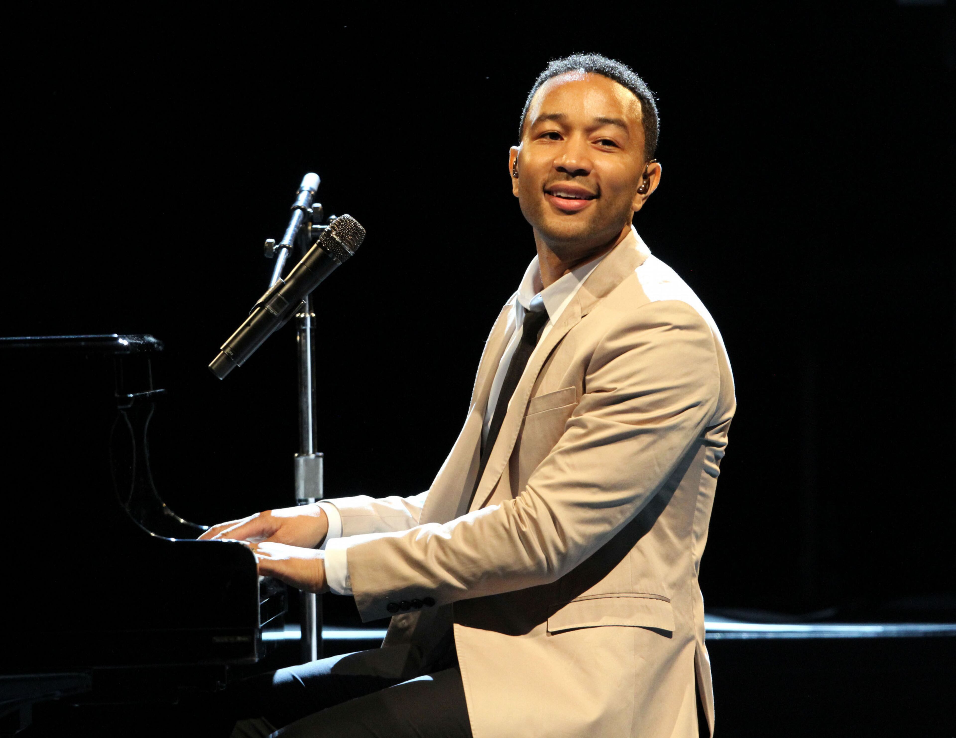 John Legend performs "Get Lifted" for a sold-out crowd Tuesday, July 29, 2014 at Chastain Park Amphitheatre in Atlanta during a stop on his All of Me tour. (Robb D. Cohen/RobbsPhotos.com)