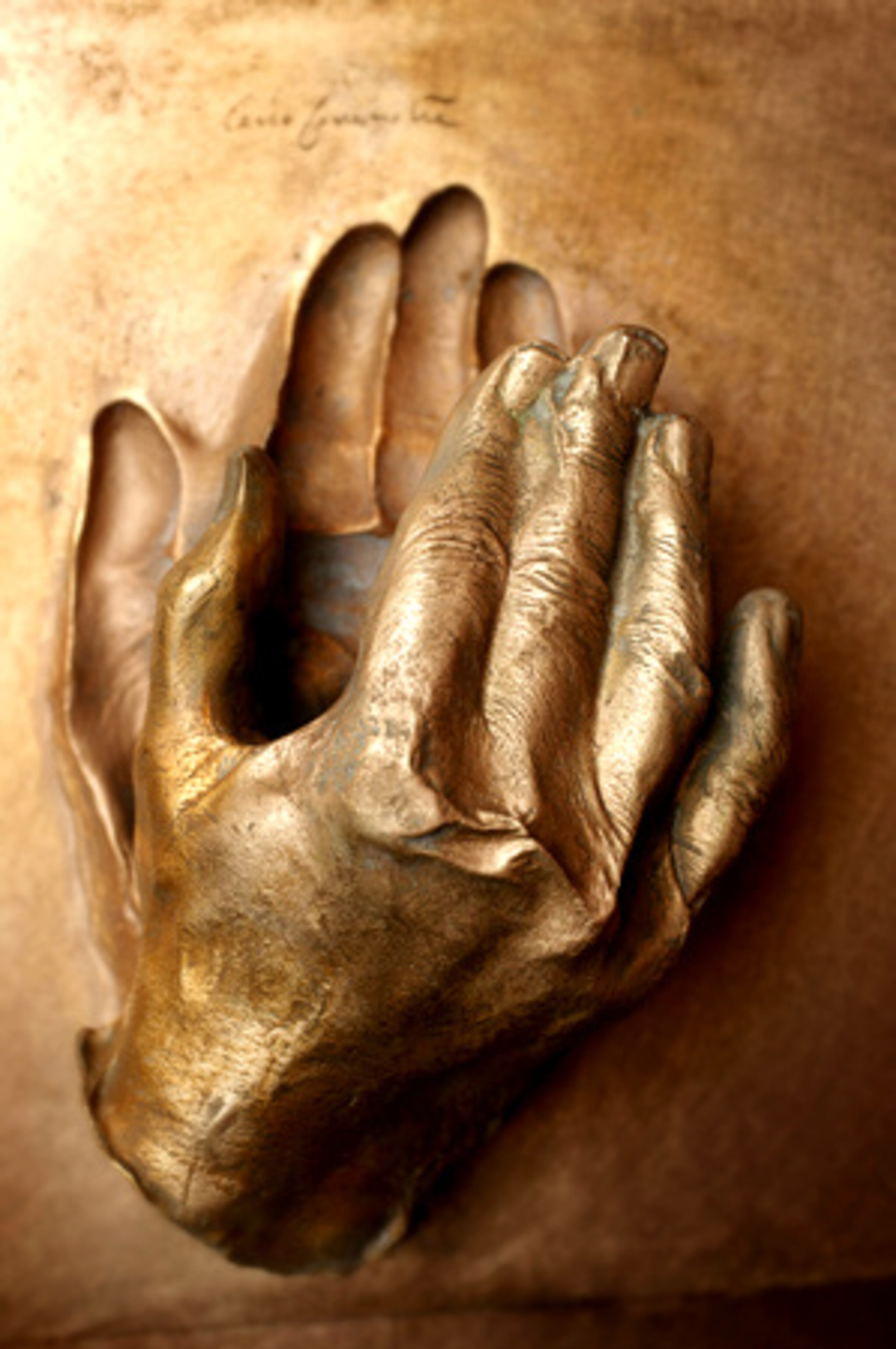 A bronze cast of the Hand of Pope John Paul II by Cecco Bonanotte (born 1942).