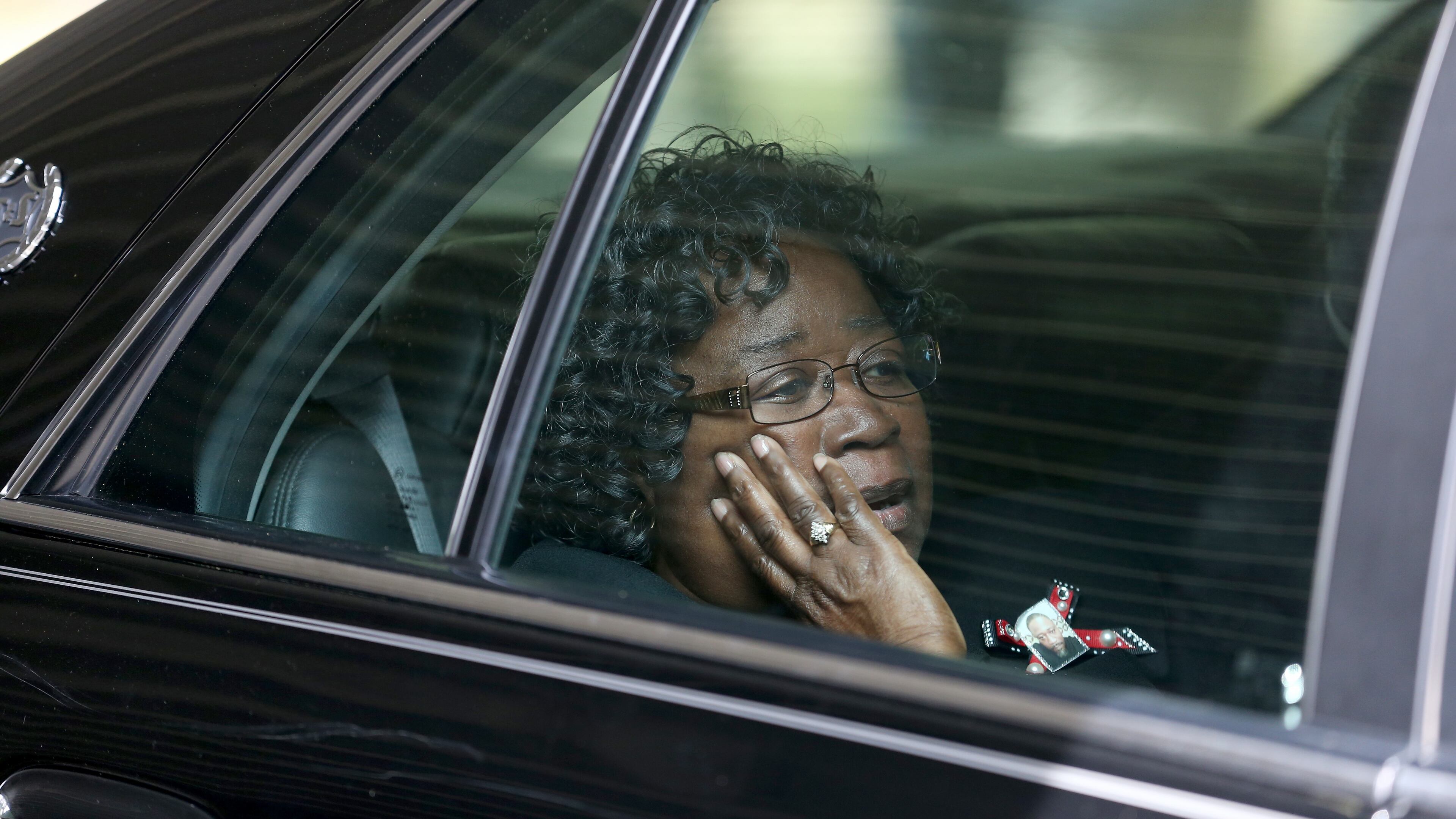 SUMMERVILLE, SC - APRIL 11: Judy Scott sits in a vehicle after the funeral for her son Walter Scott, at the W.O.R.D. Ministries Christian Center, after he was fatally shot by a North Charleston police officer after fleeing a traffic stop in North Charleston on April 11, 2015 in Summerville, South Carolina. Mr. Scott was killed on April 4 by North Charleston police officer Michael T. Slager after a traffic stop. The officer now faces murder charges. (Photo by Joe Raedle/Getty Images)