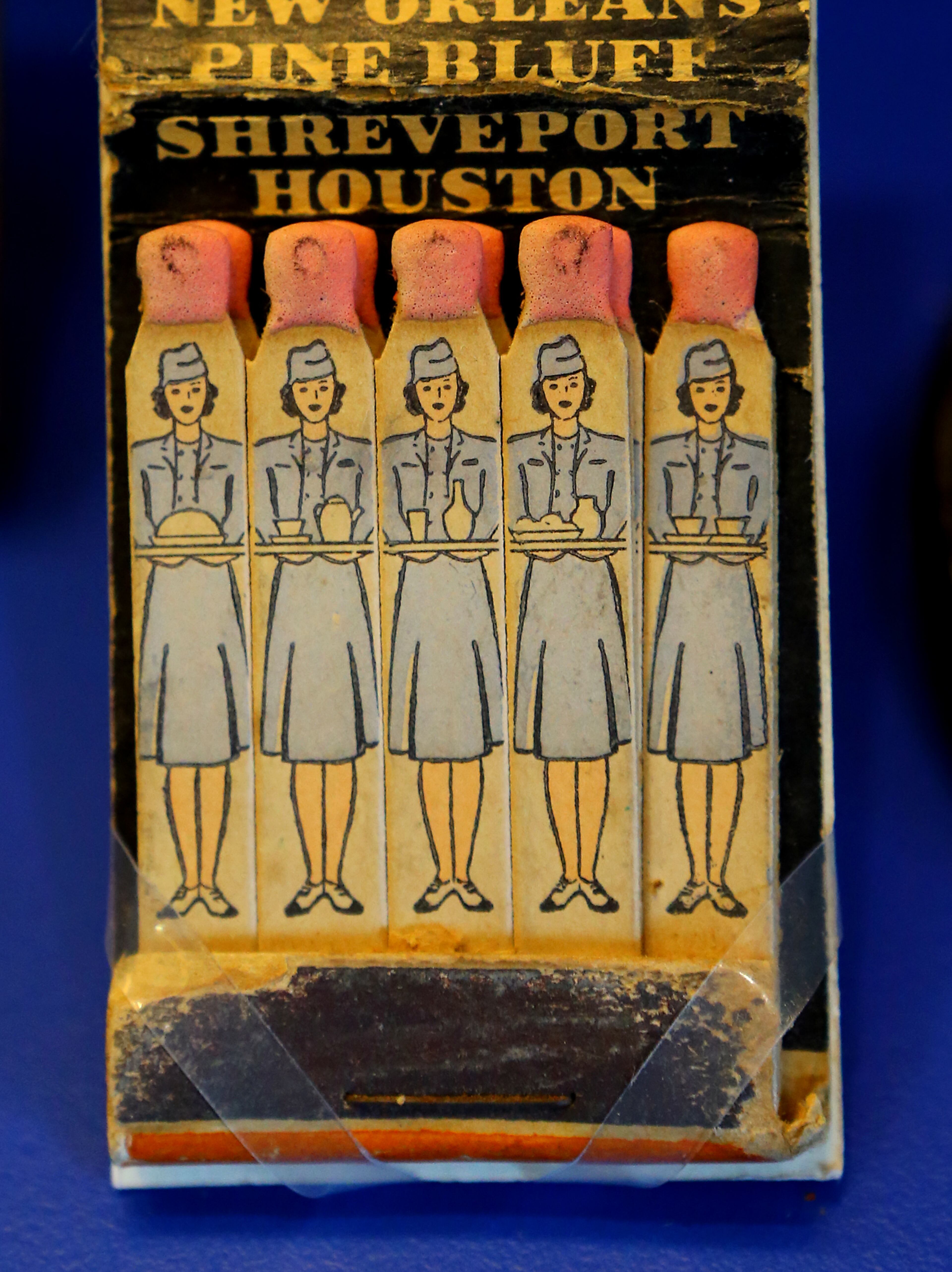 061214 ATLANTA: A circa 1940 book of airline matches features flight attendants on display at the Delta Flight Museum on Thursday, June 12, 2014, in Atlanta. CURTIS COMPTON / CCOMPTON@AJC.COM