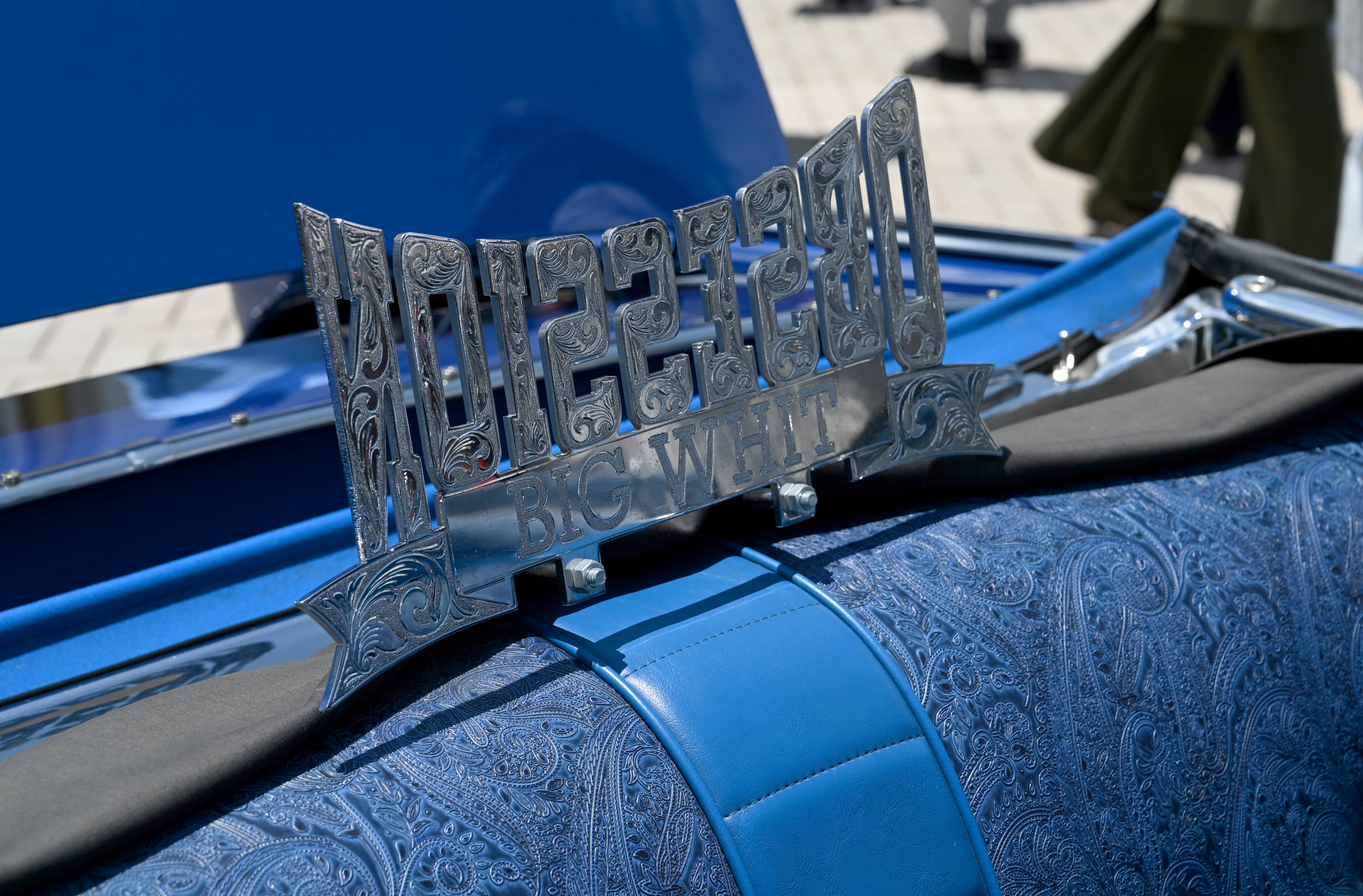 Custom blue 1957 Chevrolet Bel Air that Ice Cube drove onto the field at Dodger Stadium on Opening Day is displayed during the 4th Annual Rick Ross Car and Bike Show, Saturday, June 7, 2025, in Fayetteville. The 4th Annual Rick Ross Car and Bike Show will include a vendor market with more than 30 vendors, food trucks, fleets of classic/custom automobiles, luxury vehicles, boats, RVs and trailers on the front of the mansion. Stage performances include Plies, Ross' new signee Nino Breeze and Ross himself. (Hyosub Shin / AJC)