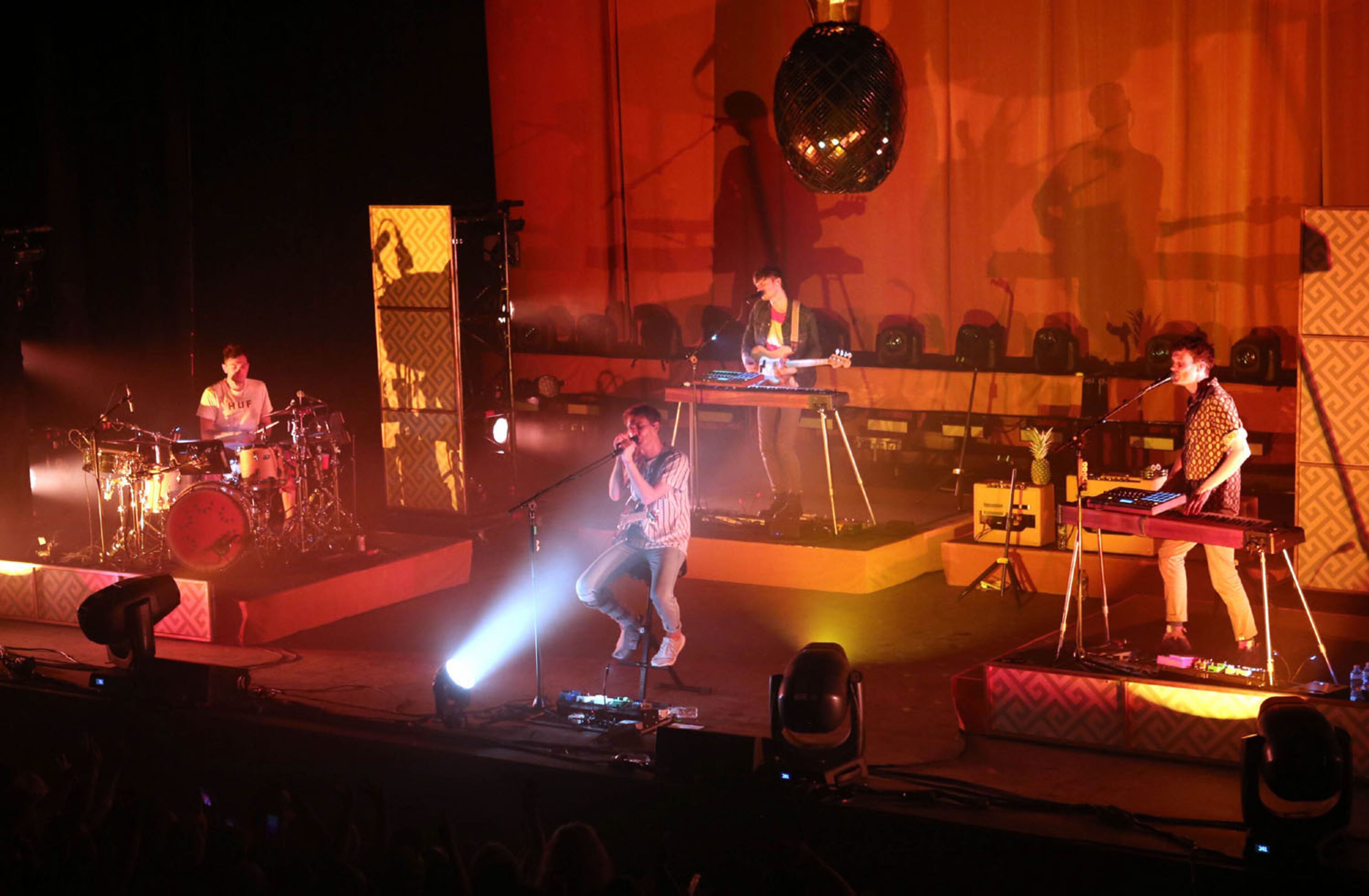 #5 of #34. PLEASE KEEP IN SEQUENTIAL ORDER FOR THE CONTINUITY OF THE GALLERY.
-- Glass Animals perform "Hazey." Lead singer Dave Bayley recently injured his right foot, though he didn't let that stop him from energetically moving around the stage.
The Coca Cola Roxy Theater held its grand opening celebration on Saturday, April 8, 2017, with British indie favorites Glass Animals and Australia's Jagwar Ma selling out the venue for Radio 105.7's fouth birthday party bash. Located in the nearly completed Battery entertainment district, next to SunTrust Park, new home of the Atlanta Braves, the gorgeous, nearly 4,000 capacity venue got positive grades from most of the VIP's and concert fans in attendence.
Robb Cohen Photography & Video /RobbsPhotos.com