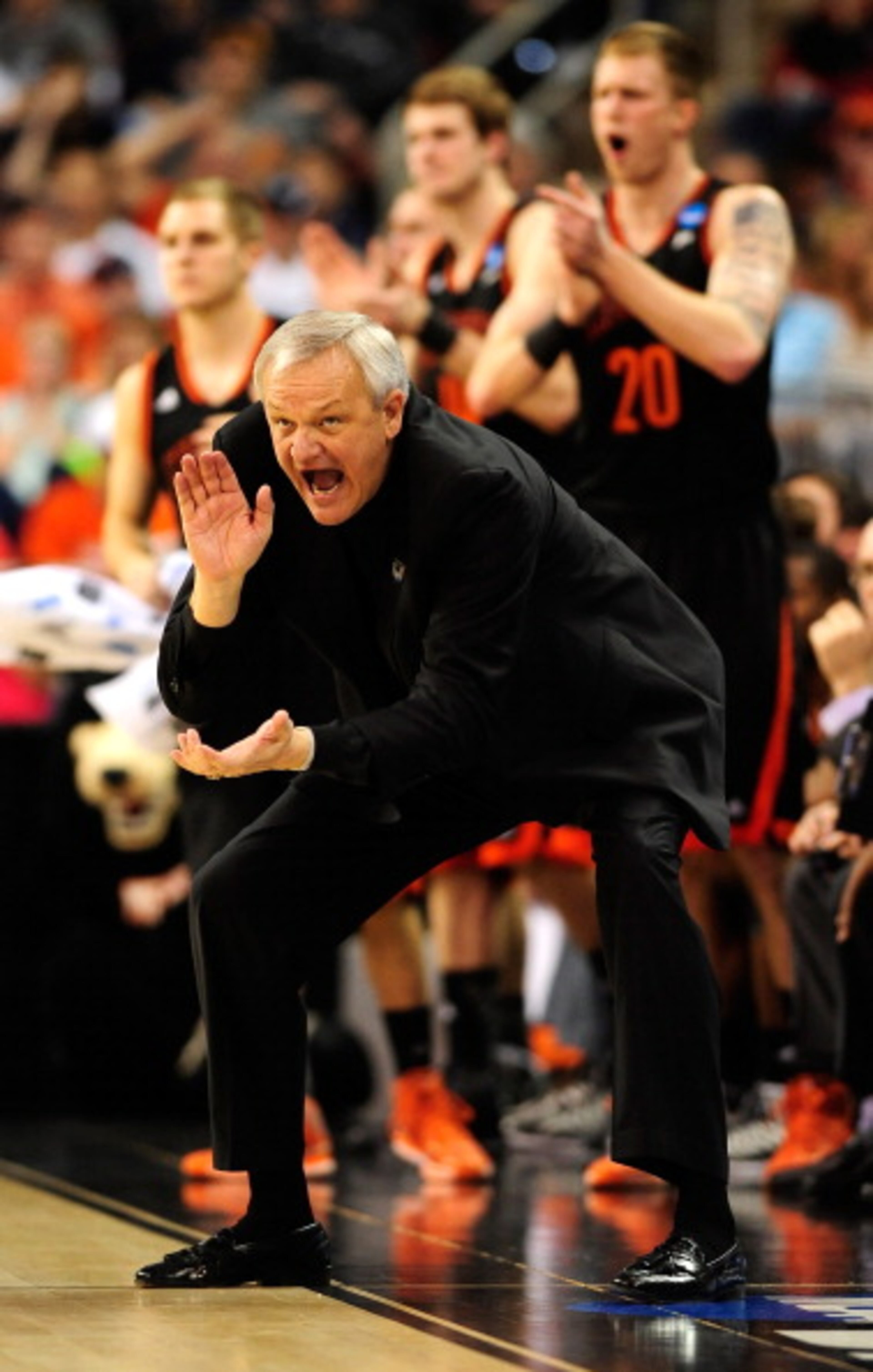 RALEIGH, NC - MARCH 23: Head coach Bob Hoffman of the Mercer Bears reacts on the sideline in the second half against the Tennessee Volunteers during the third round of the 2014 NCAA Men's Basketball Tournament at PNC Arena on March 23, 2014 in Raleigh, North Carolina. (Photo by Grant Halverson/Getty Images)