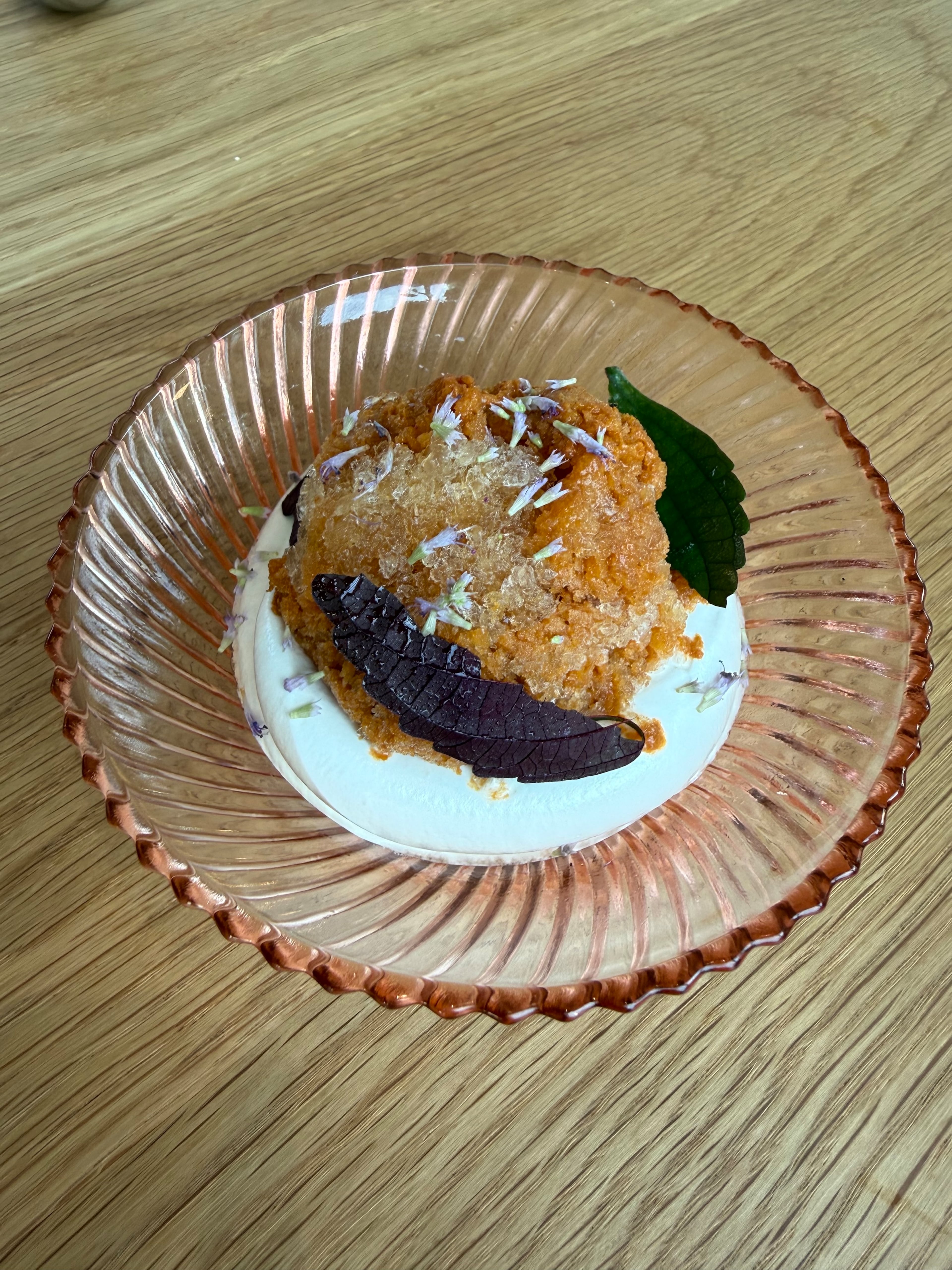 A crisp peach granita sits atop a pillow of soft marshmallow at So. Fox in Virginia Highland. (Angela Hansberger for the AJC)