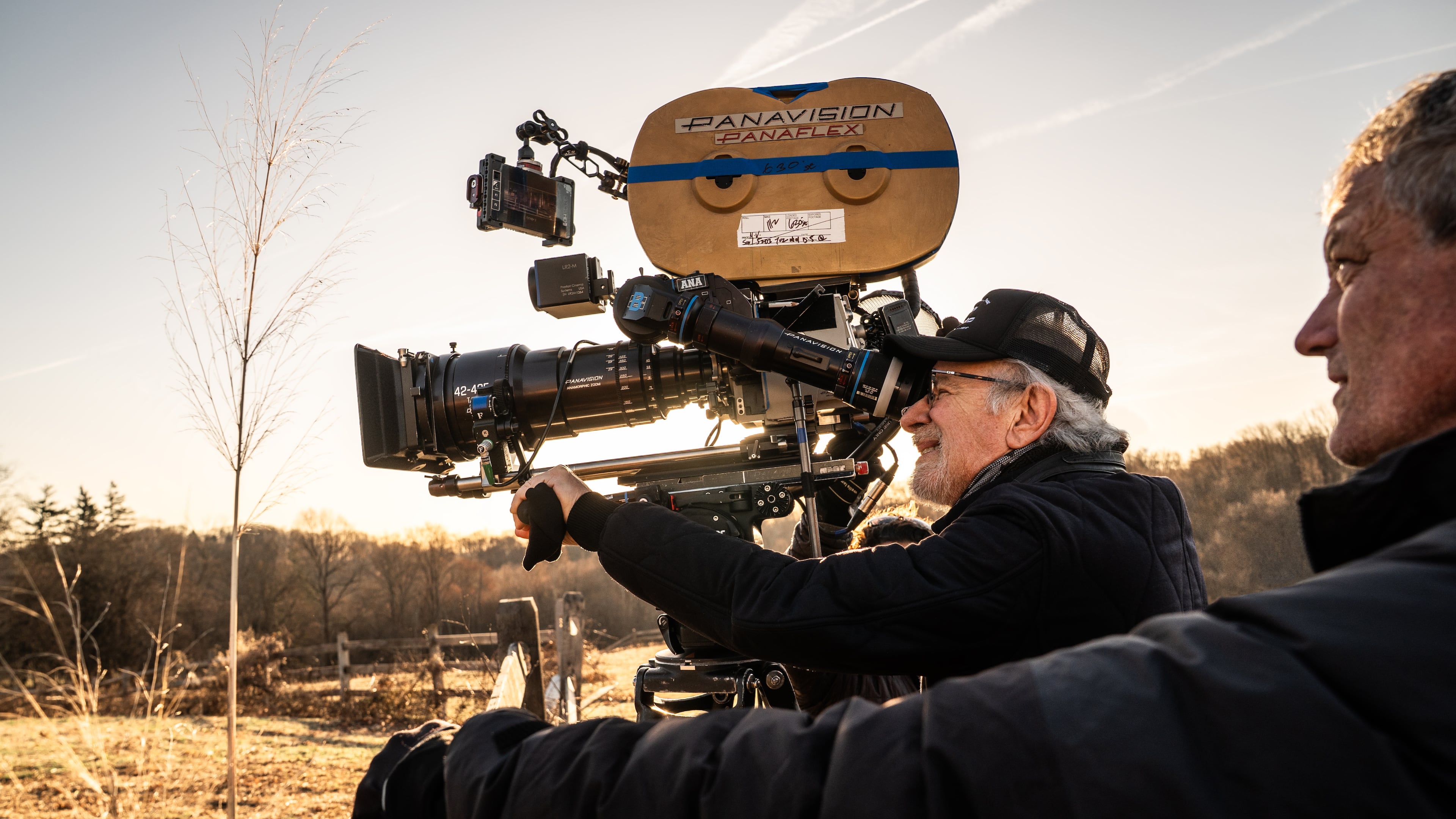 This image released by Universal Pictures shows director Steven Spielberg, center, on the set of "Disclosure Day." (Niko Tavernise/Universal Pictures and Amblin Entertainment via AP)