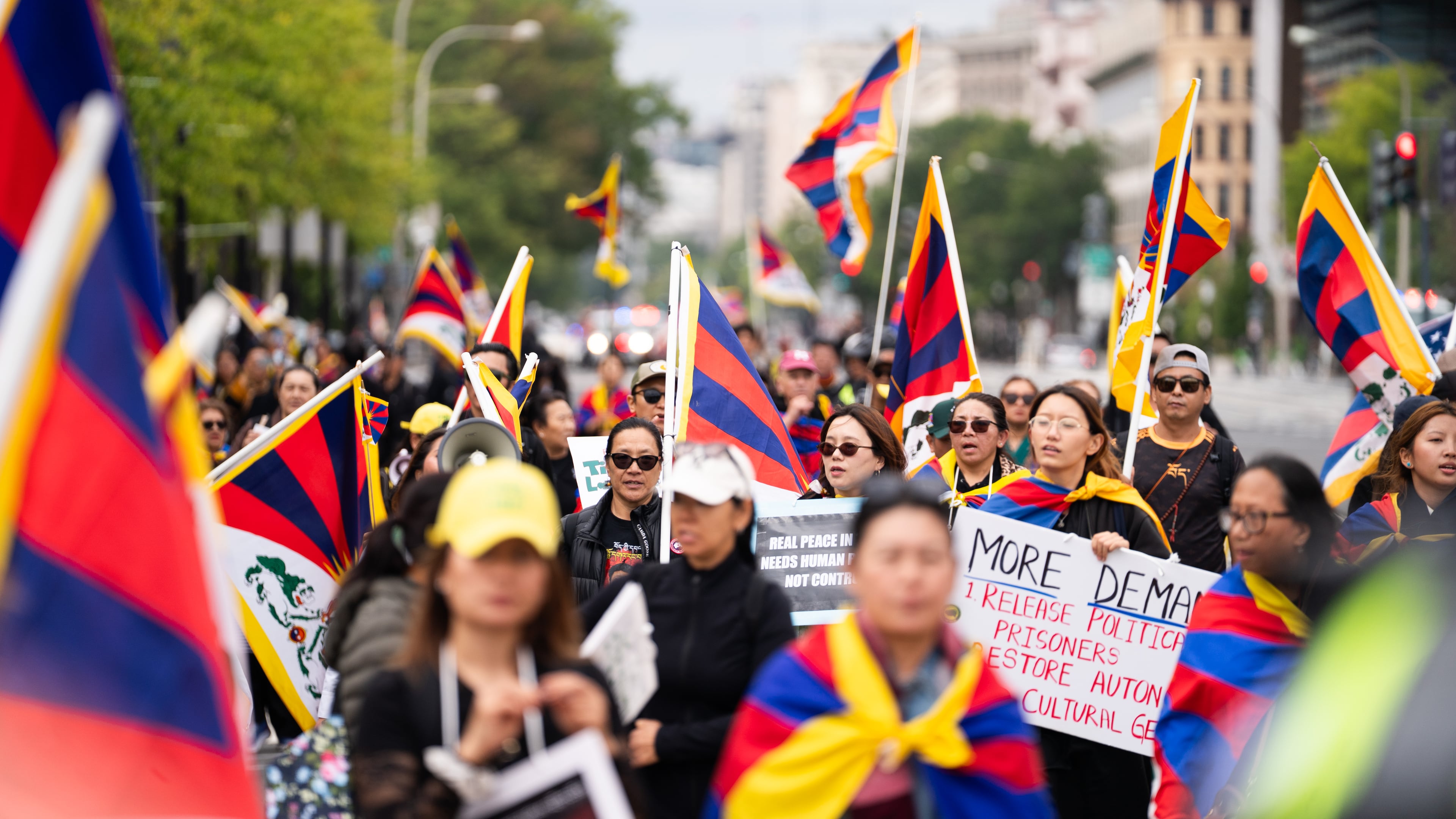 Pro-Tibet independence protestors demonstrate near the U.S. Capitol while China's President Xi Jinping visits the White House, Thursday, Sept. 24, 2026, in Washington. (AP Photo/Allison Robbert)