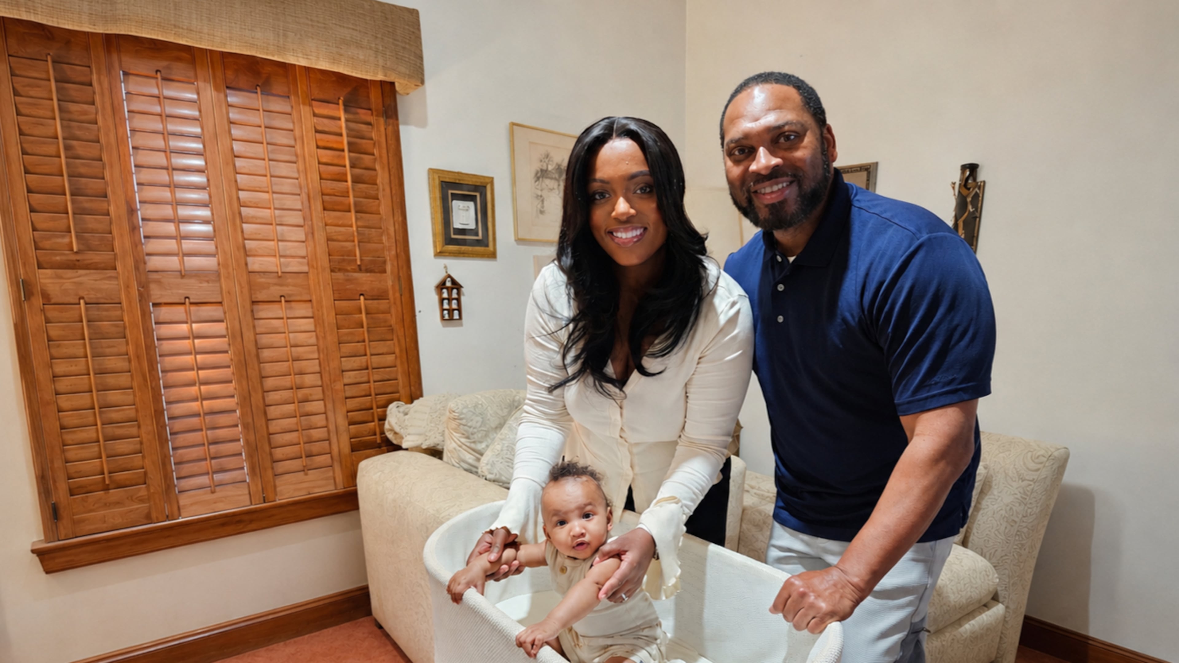 Briana and Amos Faucette are grateful for restful sleep through the SNOO bassinet for their son, Asher, provided by the city of Atlanta as an employee benefit. (Courtesy of Betty J. Barnes)