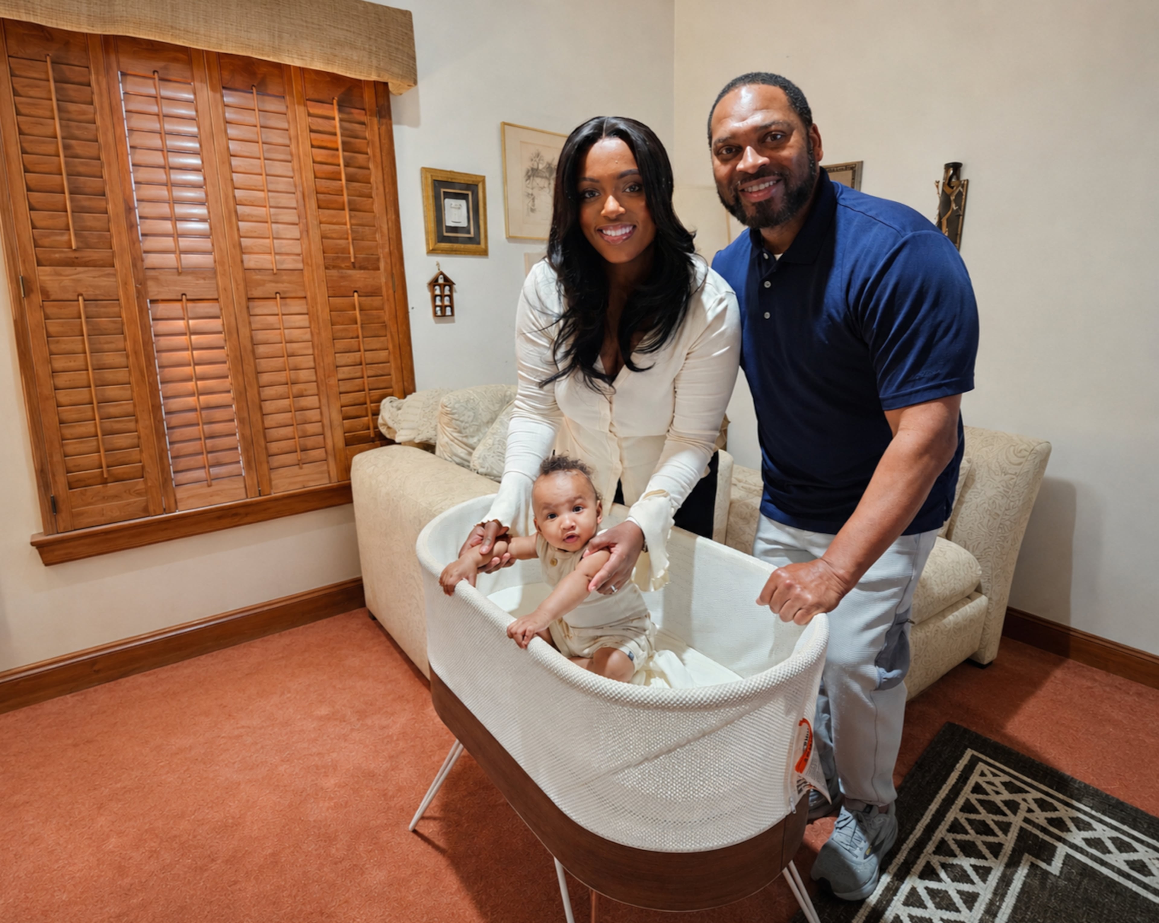 Briana and Amos Faucette are grateful for restful sleep through the SNOO bassinet for their son, Asher, provided by the city of Atlanta as an employee benefit. (Courtesy of Betty J. Barnes)
