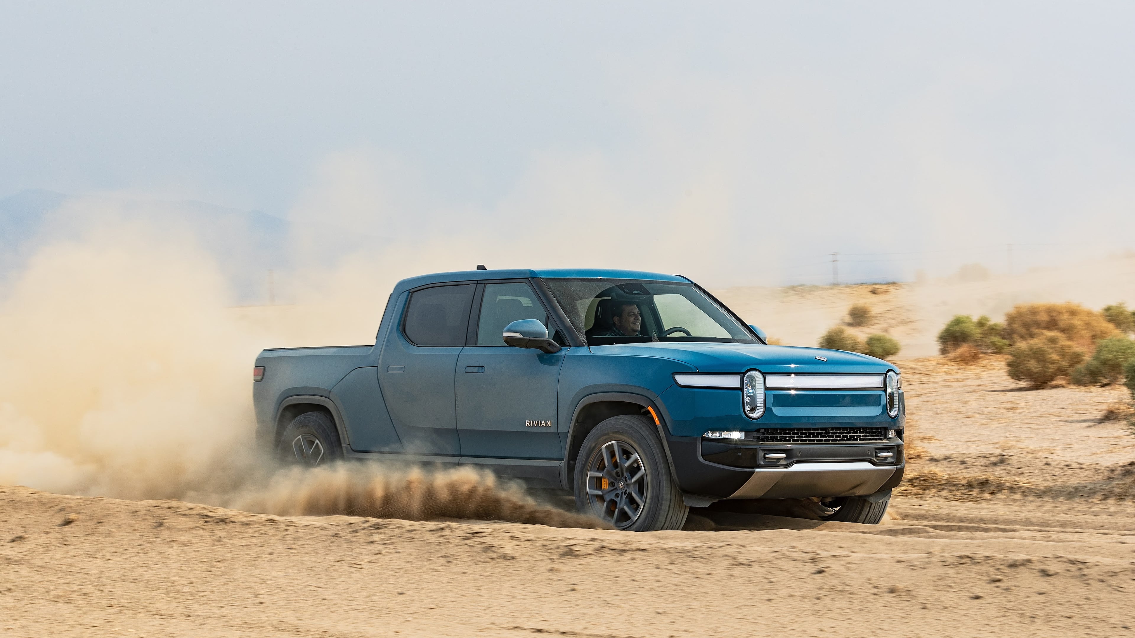 Rivian is expected to deliver its new electric truck to consumers starting in March. The company has one manufacturing site in Illinois but also is expected to build a factory in Georgia to manufacture trucks and SUVs.