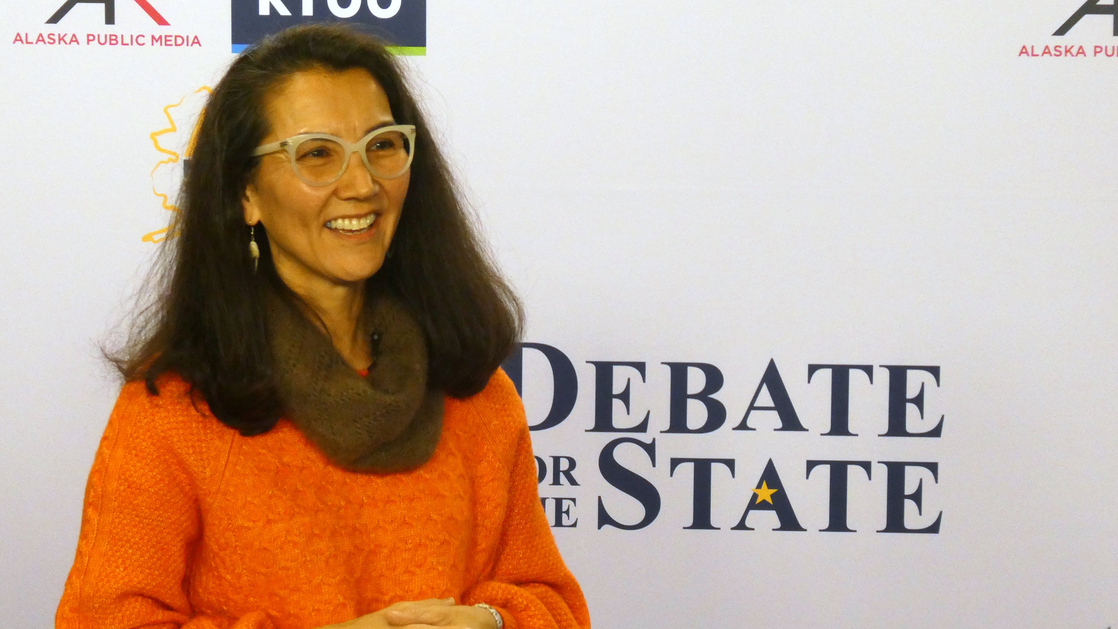 In this photo shot with a smart phone, Democrat Mary Peltola smiles ahead of a debate with Republican U.S. Sen. Dan Sullivan in Alaska's Senate race, Thursday, Oct. 15, 2026, in Anchorage, Alaska. (AP Photo/Becky Bohrer)