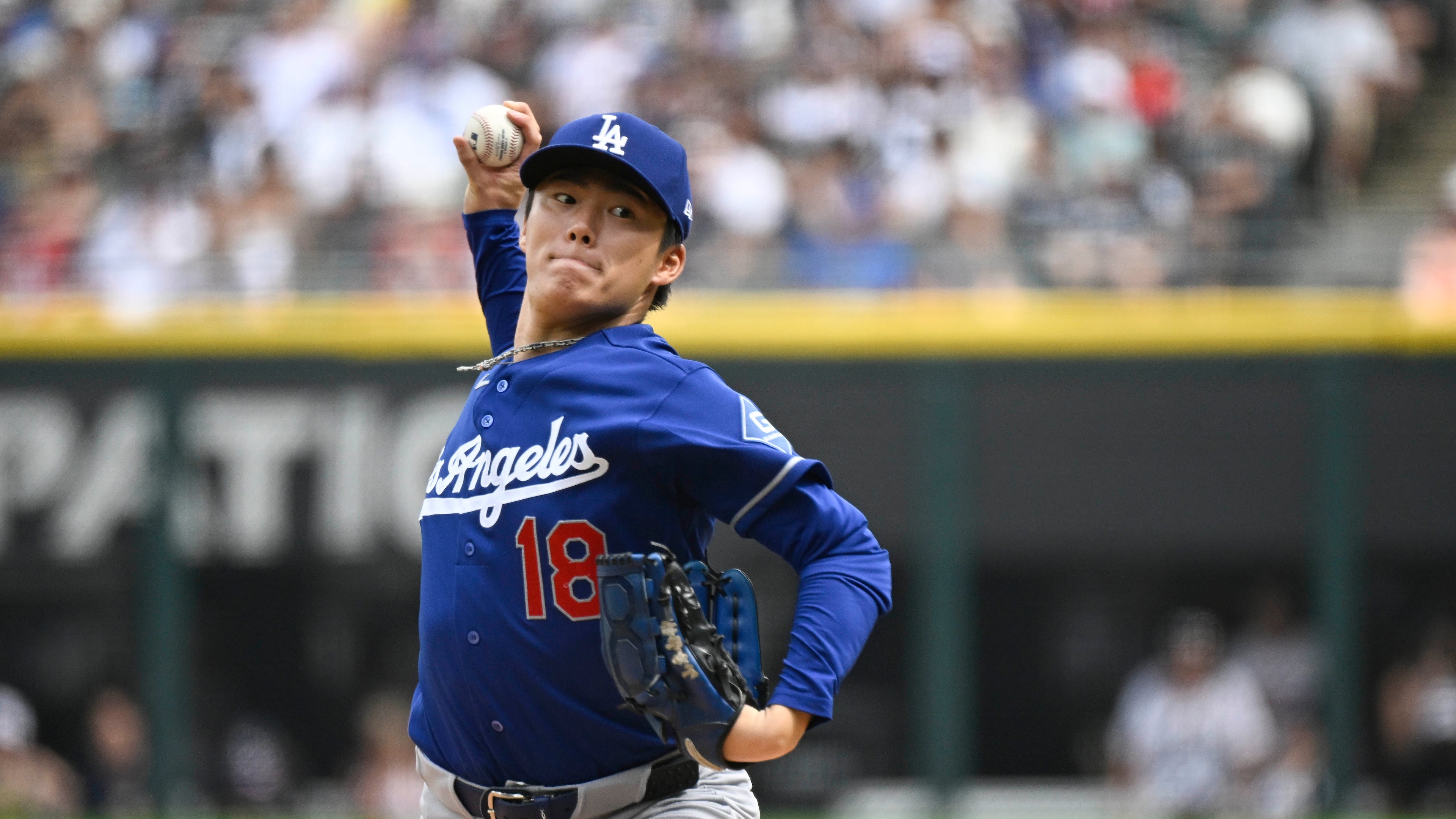 Los Angeles Dodgers pitcher Yoshinobu Yamamoto, of Japan, delivers during the first inning of a baseball game against the Chicago White Sox, Saturday, June 13, 2026, in Chicago. (AP Photo/Matt Marton)