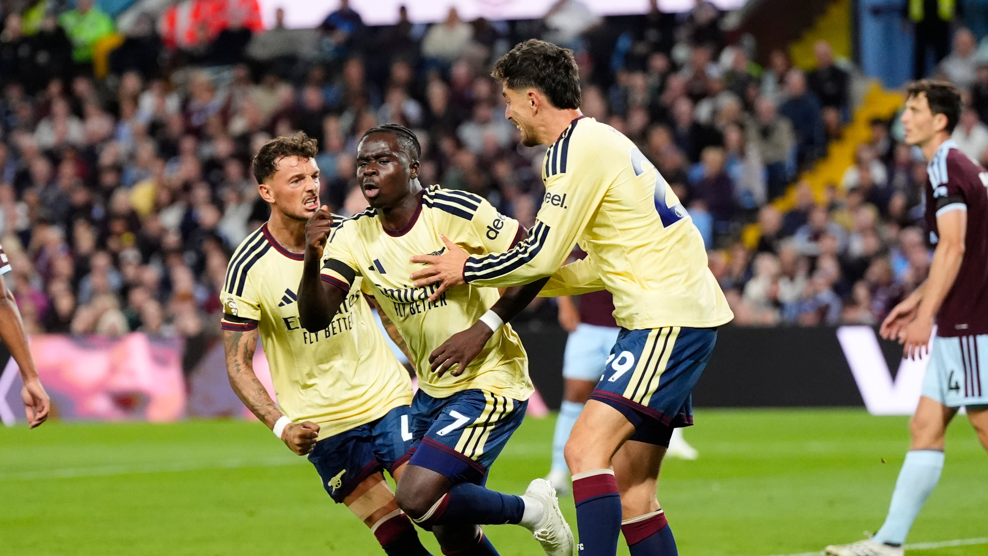 Arsenal's Bukayo Saka (7) celebrates after scoring his side's opening goal during the English Premier League soccer match between Aston Villa and Arsenal in Birmingham, England, Monday, Aug. 31, 2026. (Nick Potts/PA via AP)