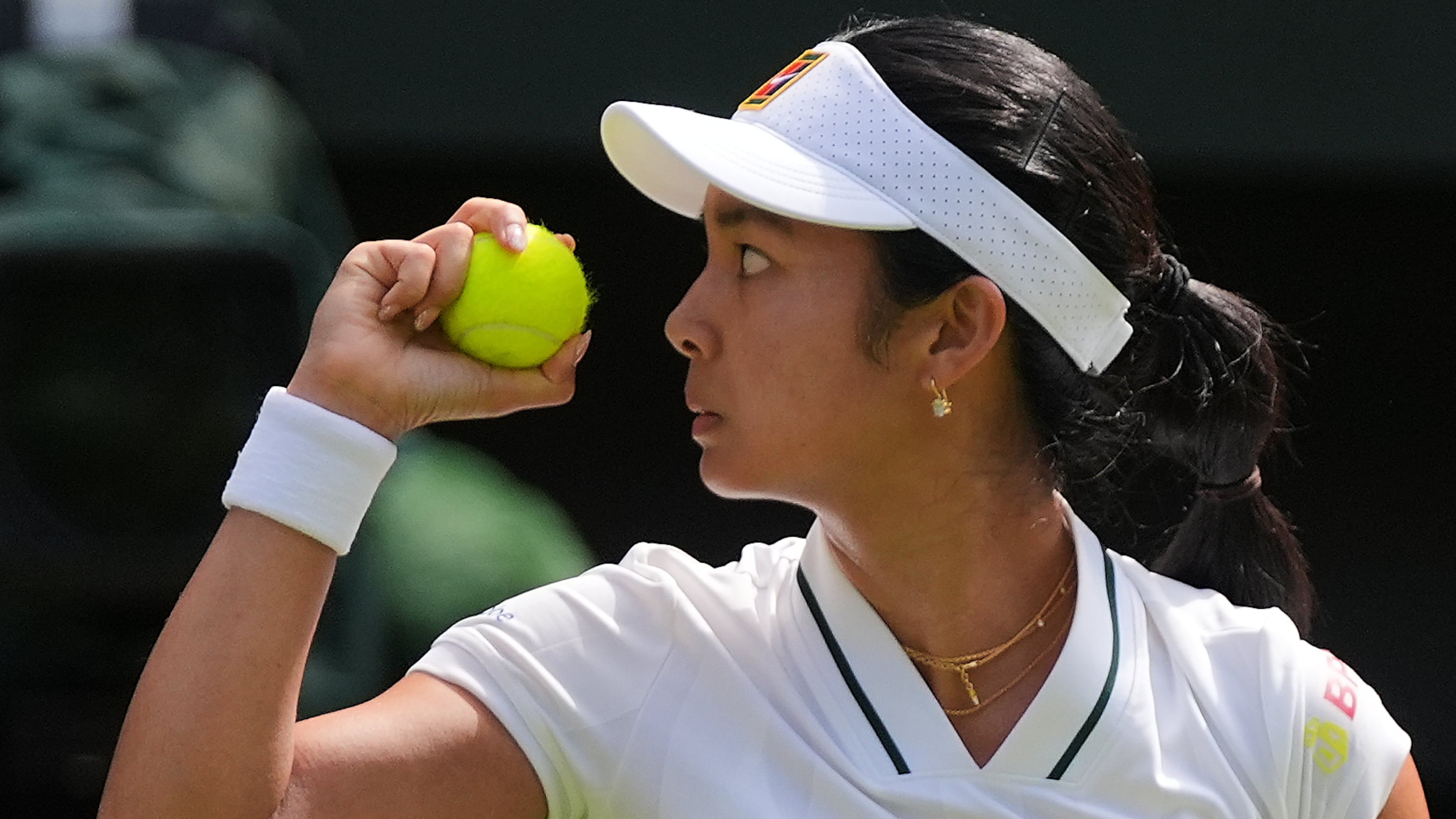 Alexandra Eala of the Philippines eyes the ball during the third round women's singles match against Iga Swiatek of Poland at the Wimbledon Tennis Championships in London, Saturday, July 4, 2026.(AP Photo/Maja Smiejkowska)