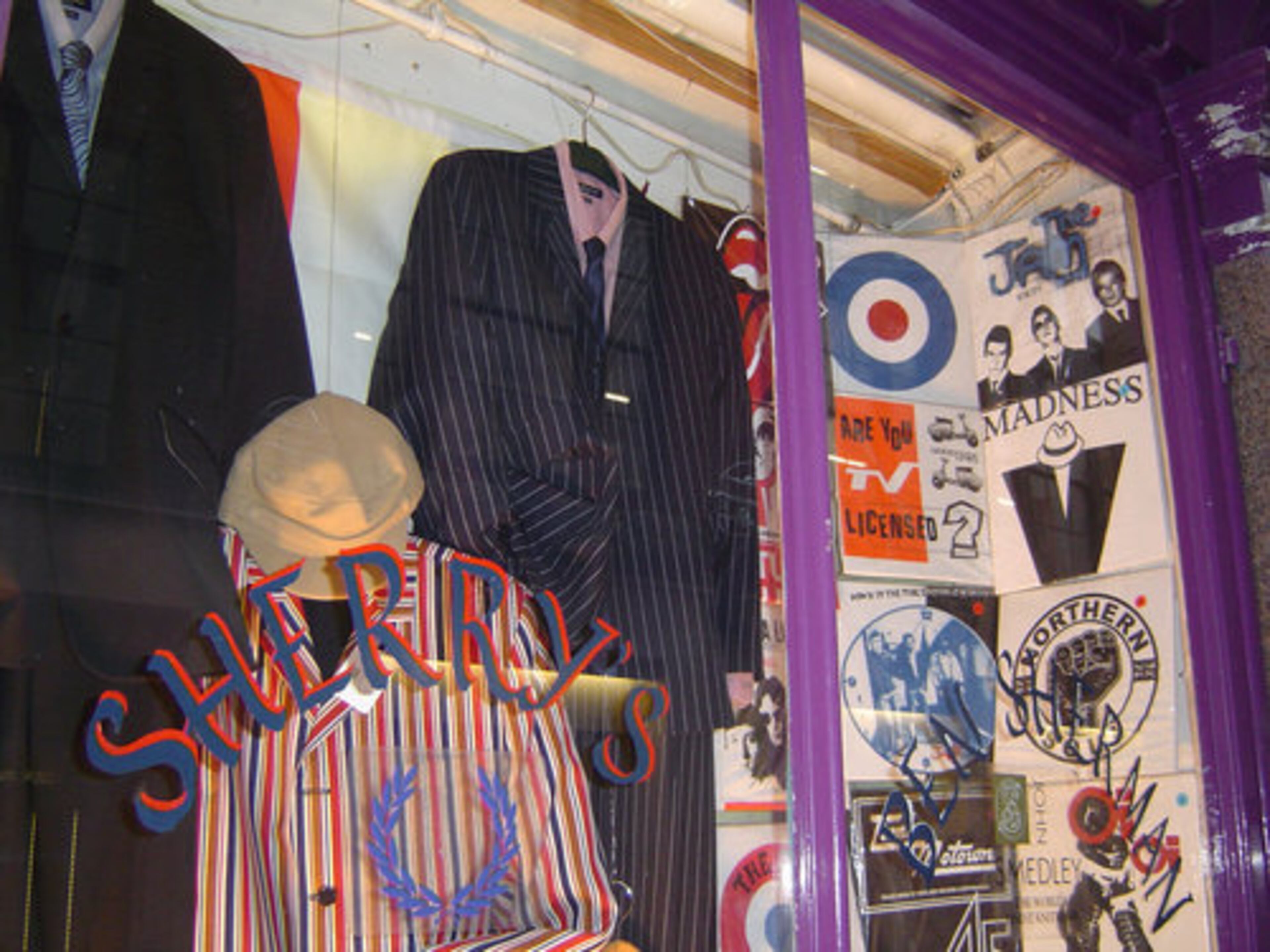 The front window of Sherry's celebrates all things Mod, from skinny striped suits to favorite bands like The Jam and The Who.