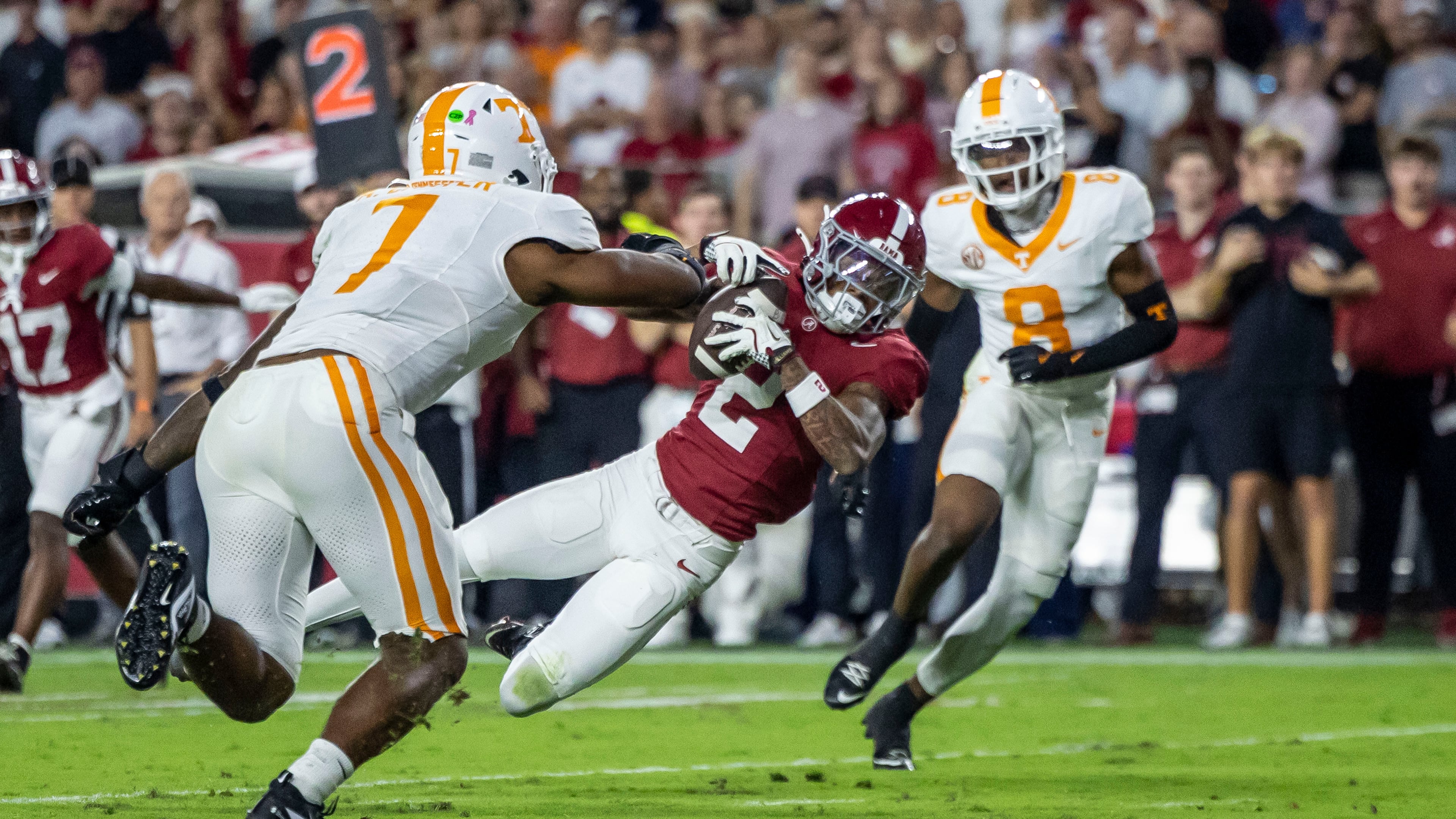 FILE - Alabama wide receiver Ryan Williams (2) grabs a pass in front of Tennessee linebacker Arion Carter (7) during the first half of an NCAA college football game, Oct. 18, 2025, in Tuscaloosa, Ala. (AP Photo/Vasha Hunt, File)