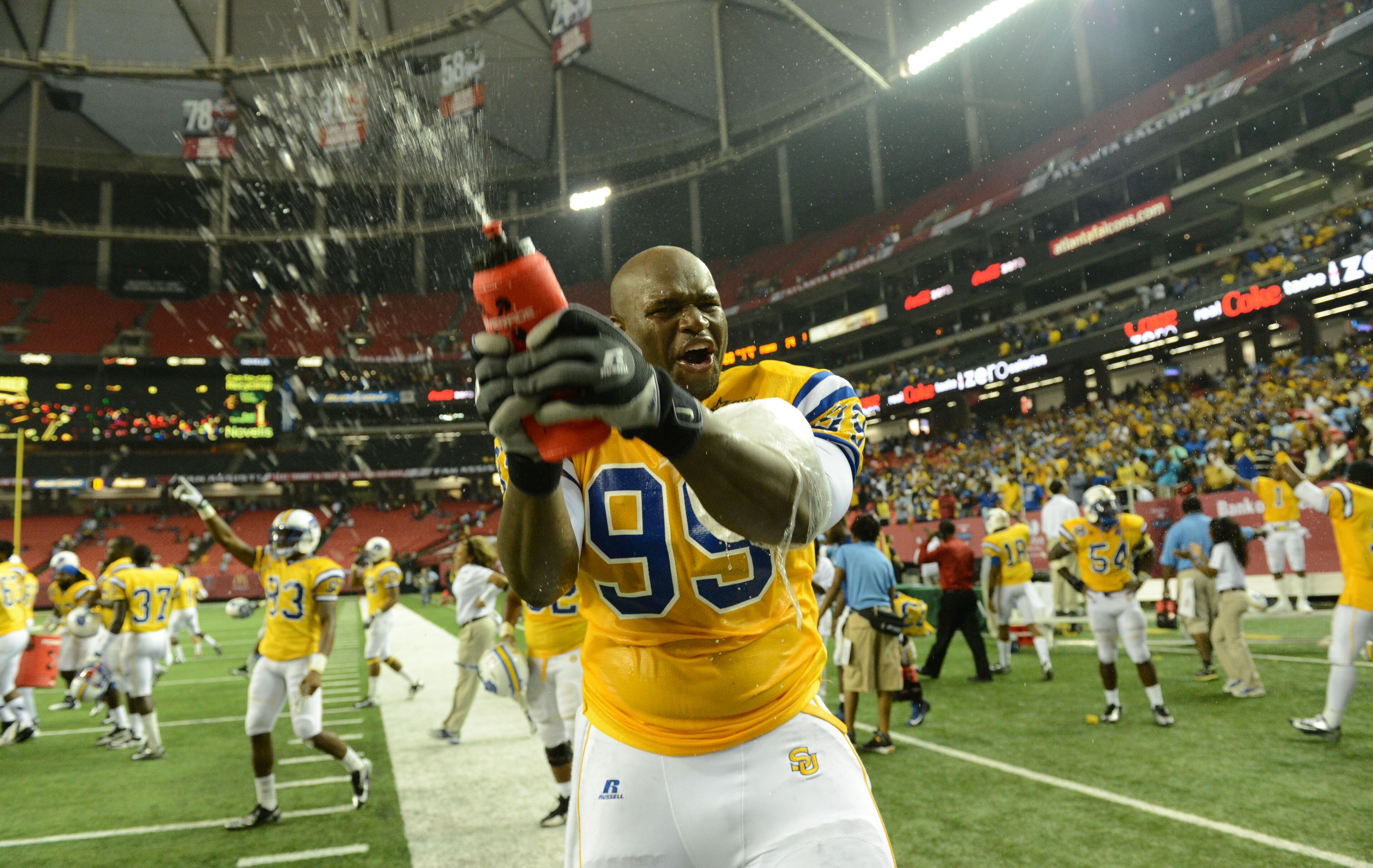 Southern running back Terrance Clayton (99) and other players celebrate their 21-14 win over the Florida A&M in the second half during the 2012 Bank of America Atlanta Football Classic at the Georgia Dome on Saturday, September 29, 2012.