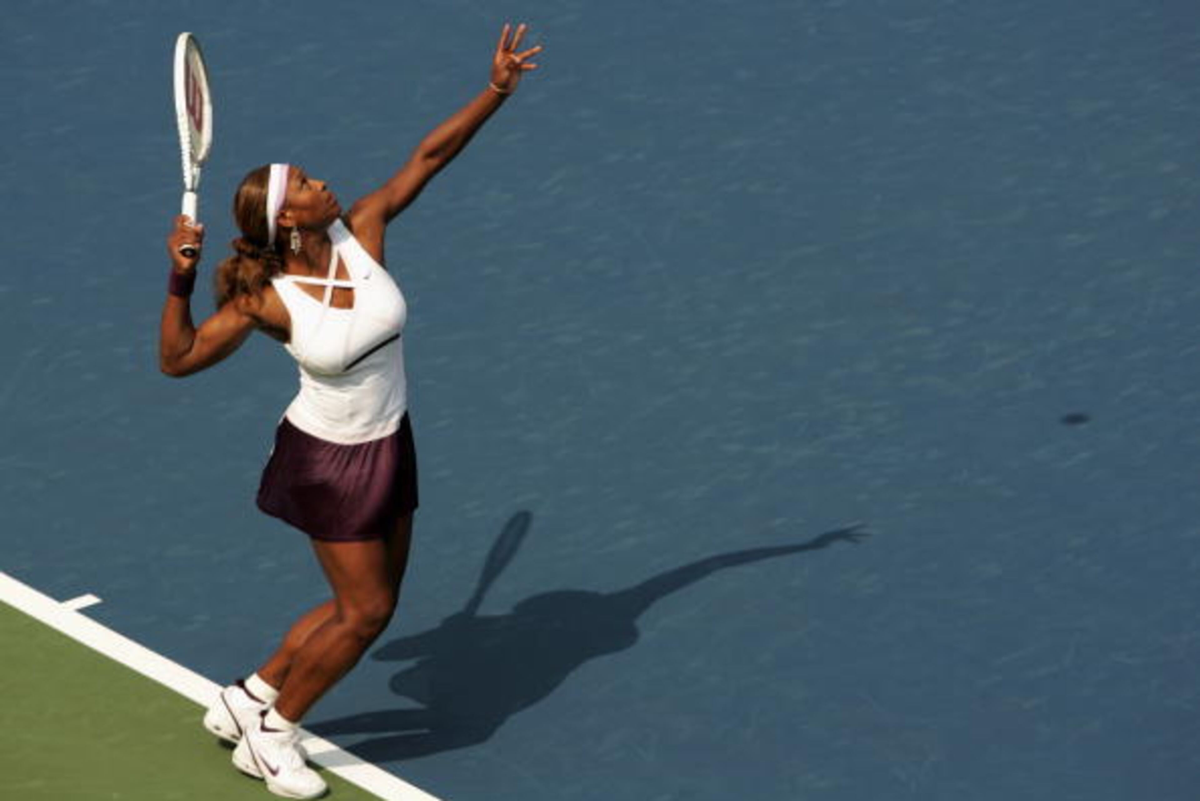 NEW YORK - AUGUST 29: Serena Williams serves to Yung-Jan Chan of Taipei during the US Open at the USTA National Tennis Center in Flushing Meadows Corona Park on August 29, 2005 in the Flushing neighborhood of the Queens borough of New York City. Williams defeated Chan 6-1, 6-3. (Photo by Nick Laham/Getty Images)