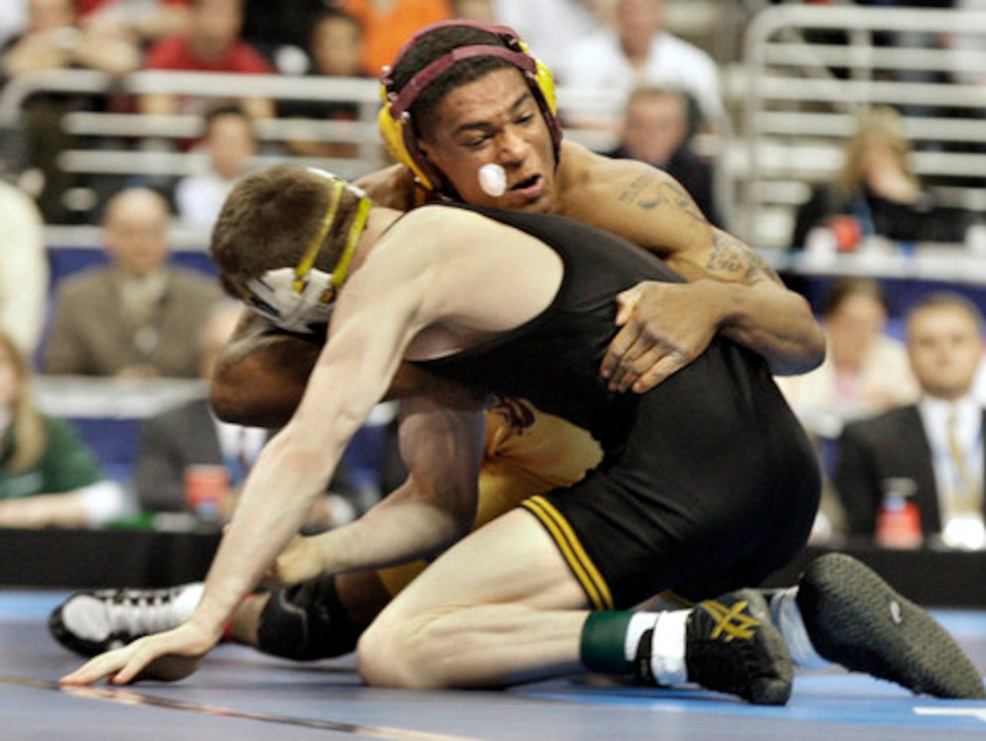 In Saturday's final at the Wells Fargo Center in Philadelphia, Robles faced Iowa sophomore Matt McDonough, the defending national champion at 125 pounds.