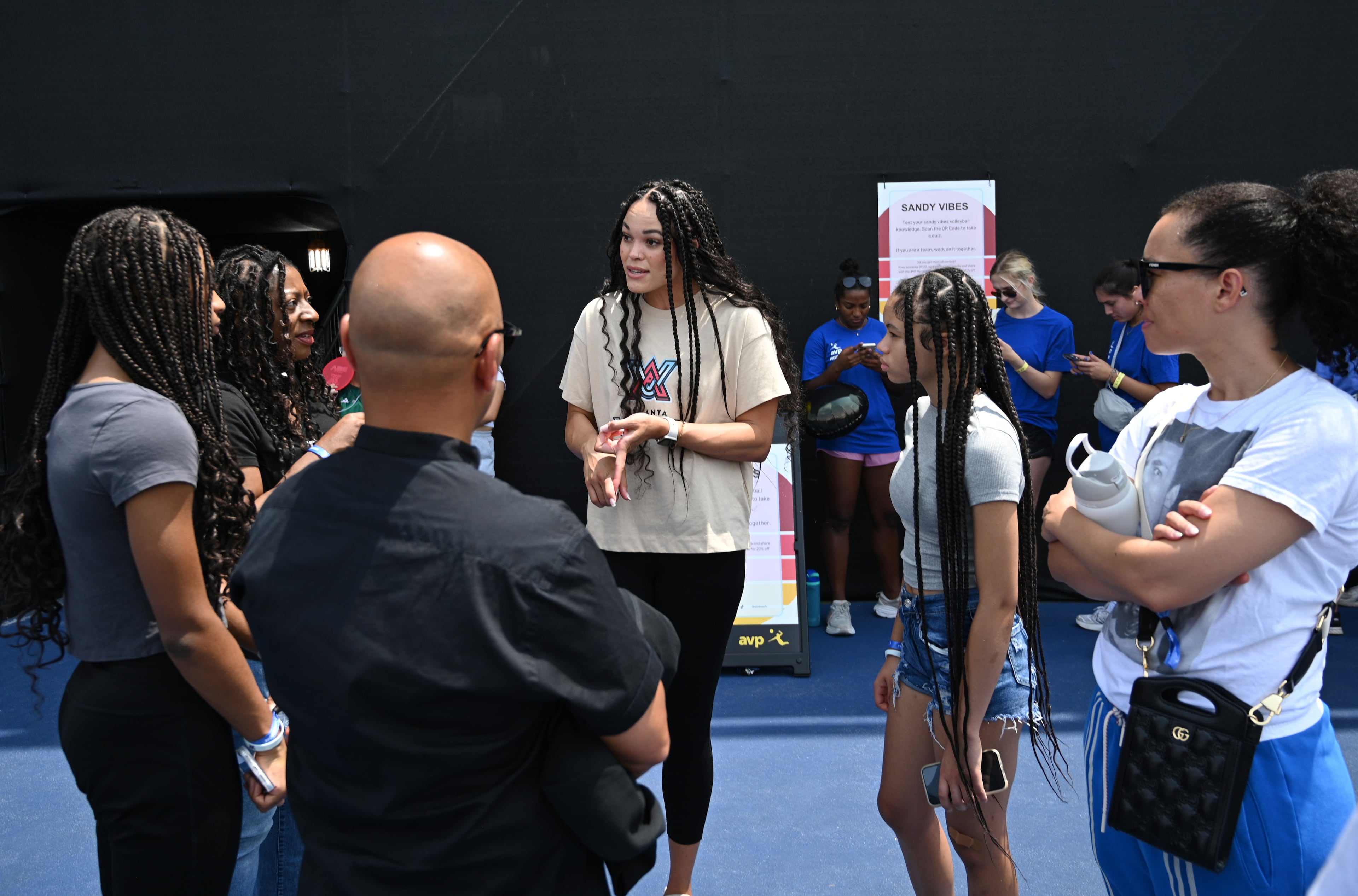 Kendra Dahlke (center), one of the players, speaks with fans. (Hyosub Shin / Hyosub.Shin@ajc.com)