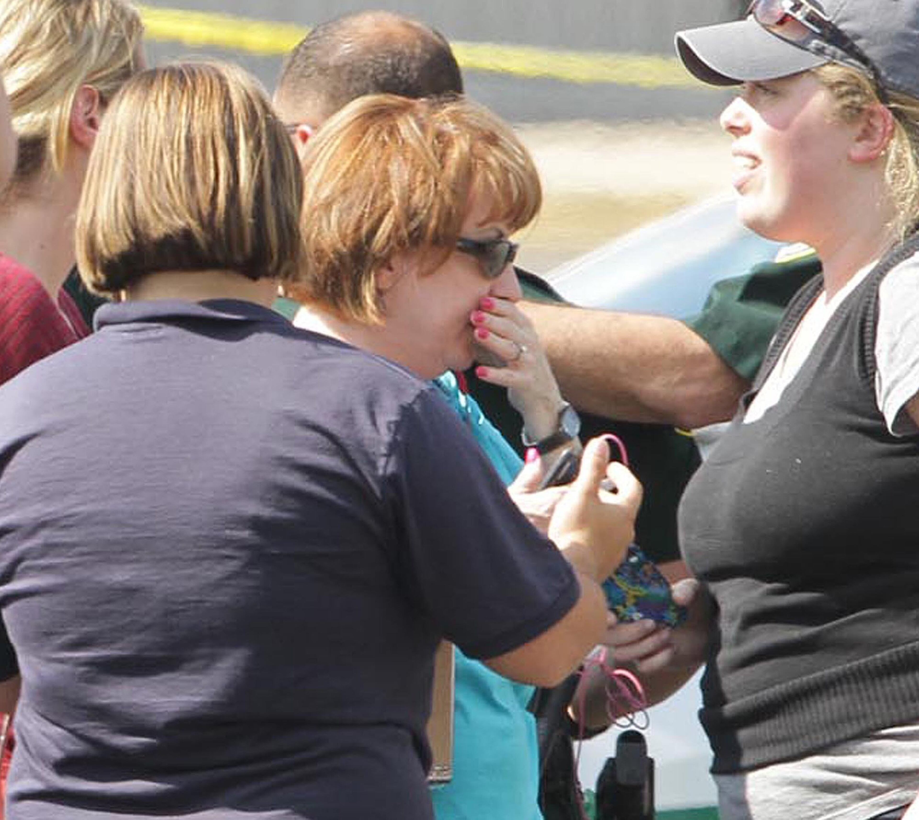 Rescue officials say 12 people, including 11 children, were injured when a car crashed into a Goldenrod Road day care center on Wednesday, April 9, 2014 in Winter Park, Fla. (Stephen M. Dowell, Orlando Sentinel/MCT)