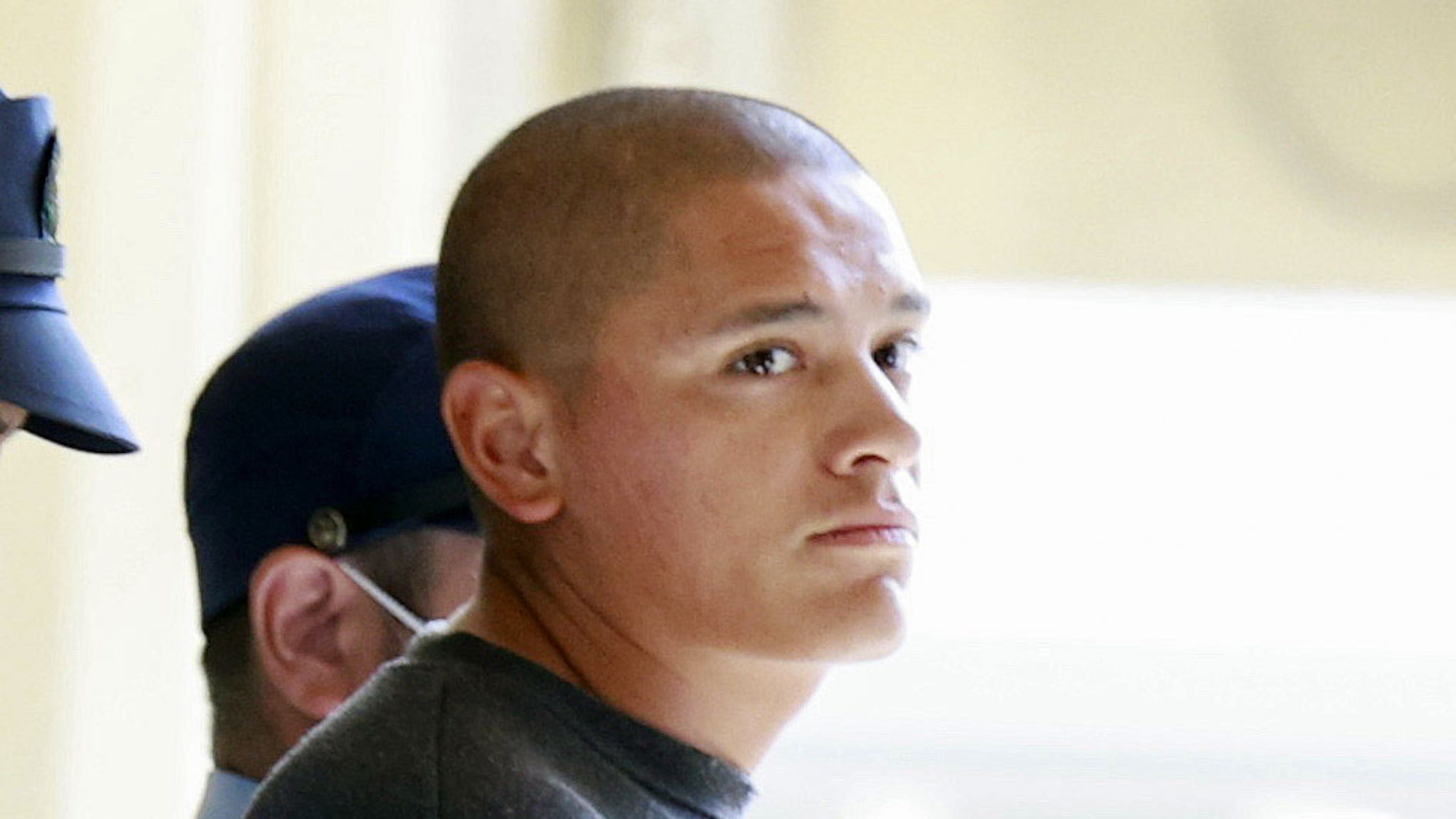 Devin Jacob Ballard, a U.S. Marine who has been in custody in an alleged robbery and murder of a woman on Japan's southern island of Okinawa, is sent over to the Naha prosecutors' office in Japan, Monday, Oct. 5, 2026. (Kotaro Ueda/Kyodo News via AP)