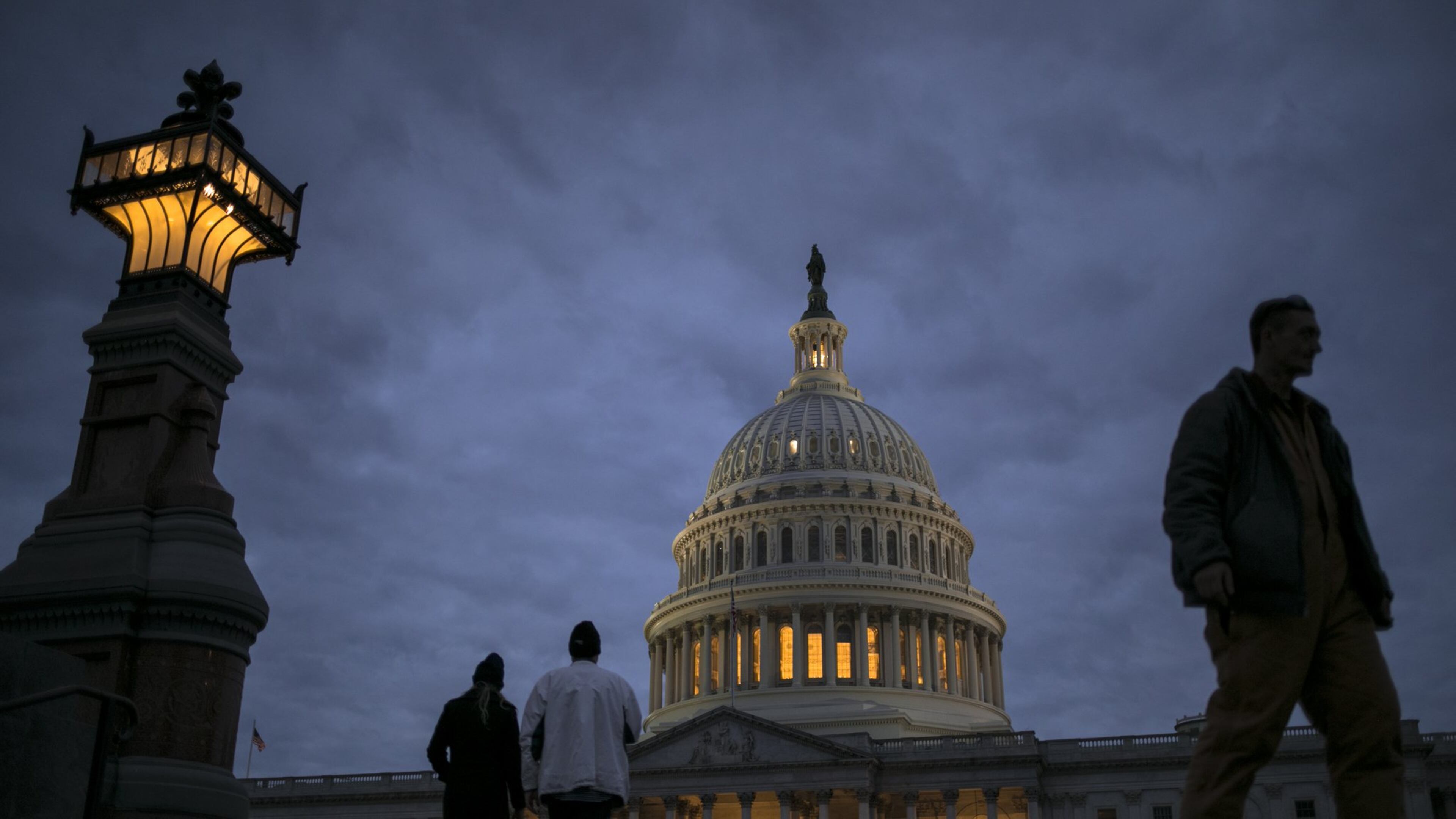 In this Jan. 21, 2018, file photo, lights illuminate the U.S. Capitol on second day of the federal shutdown as lawmakers negotiate behind closed doors in Washington. The era of trillion-dollar budget deficits is about make a comeback _ and a brewing budget deal hastened the arrival. Lawmakers are inching closer to a two-year, budget-busting spending pact that would give whopping budget increases to both the Pentagon and domestic programs have been inching closer to an agreement, according to aides and members of Congress. (AP Photo/J. Scott Applewhite, File)