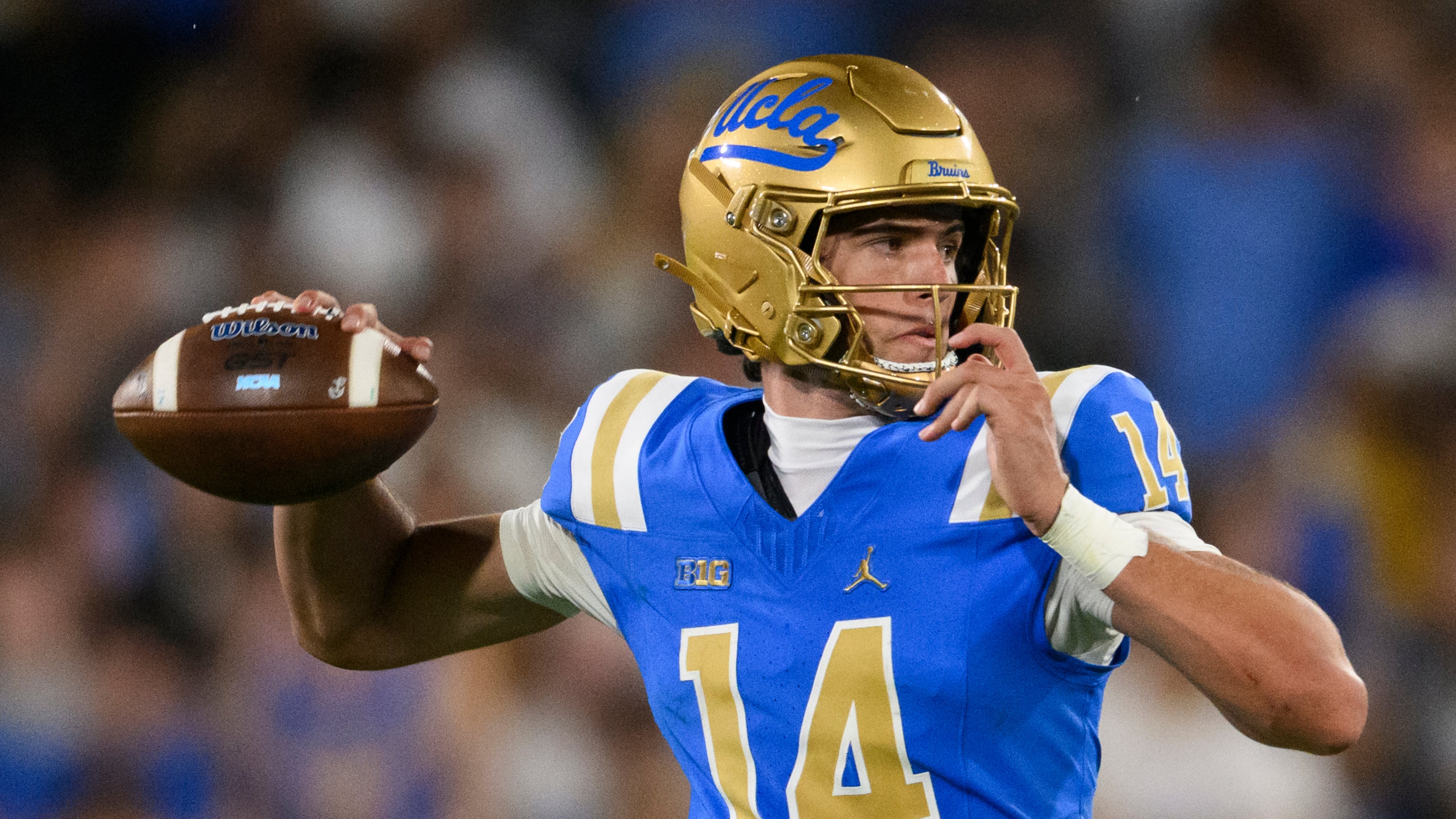 UCLA quarterback Ty Dieffenbach (14) throws a pass during the second half of an NCAA college football game against Wisconsin Saturday, Oct. 17, 2026, in Pasadena, Calif. (AP Photo/Kyusung Gong)