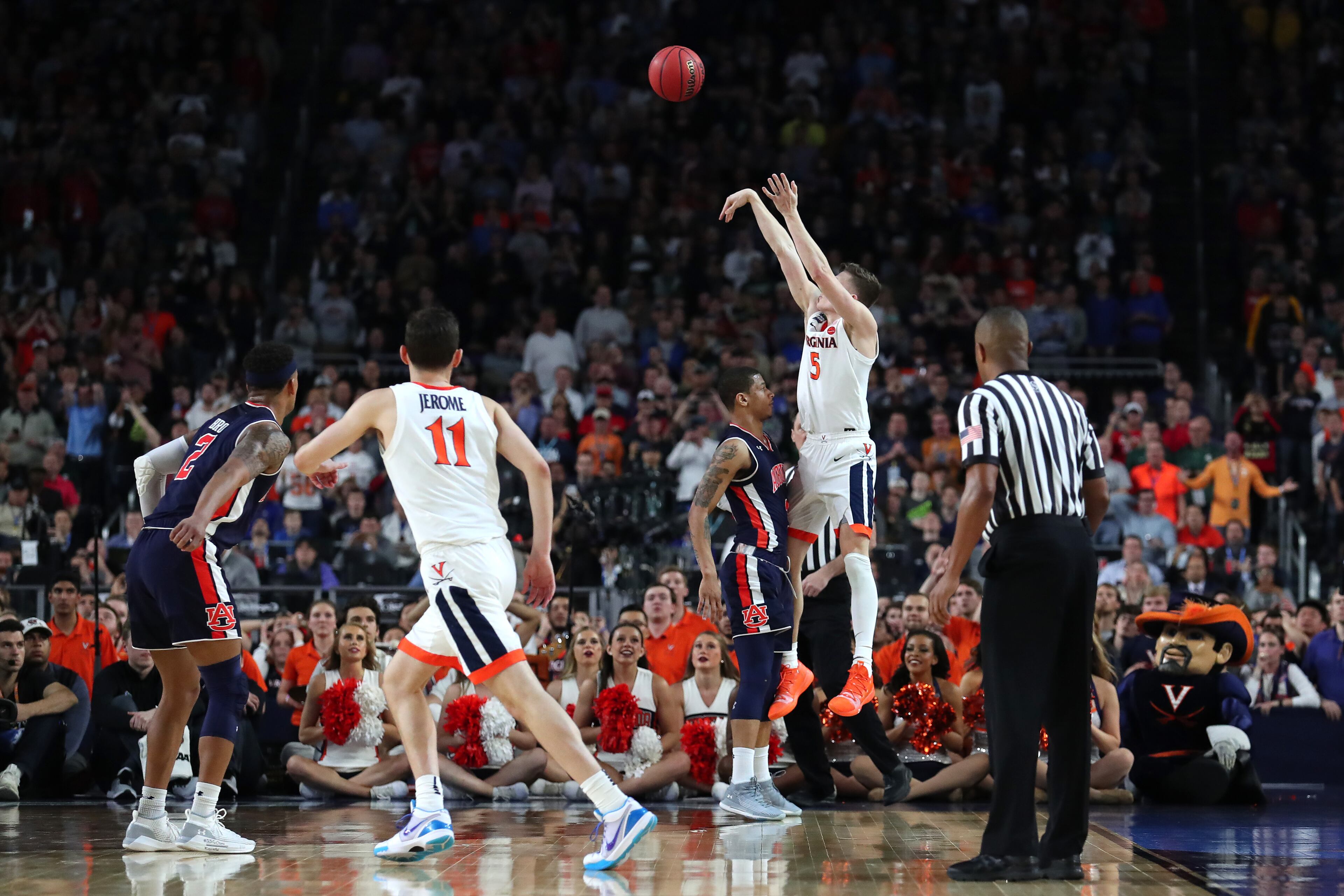 With his team down by two points, Kyle Guy of Virginia attempted a three-pointer as time expired. A foul was called on Auburn's Samir Doughty. Guy made all three free throws and the Cavs advanced to the national championship game. (Photo by Tom Pennington/Getty Images)