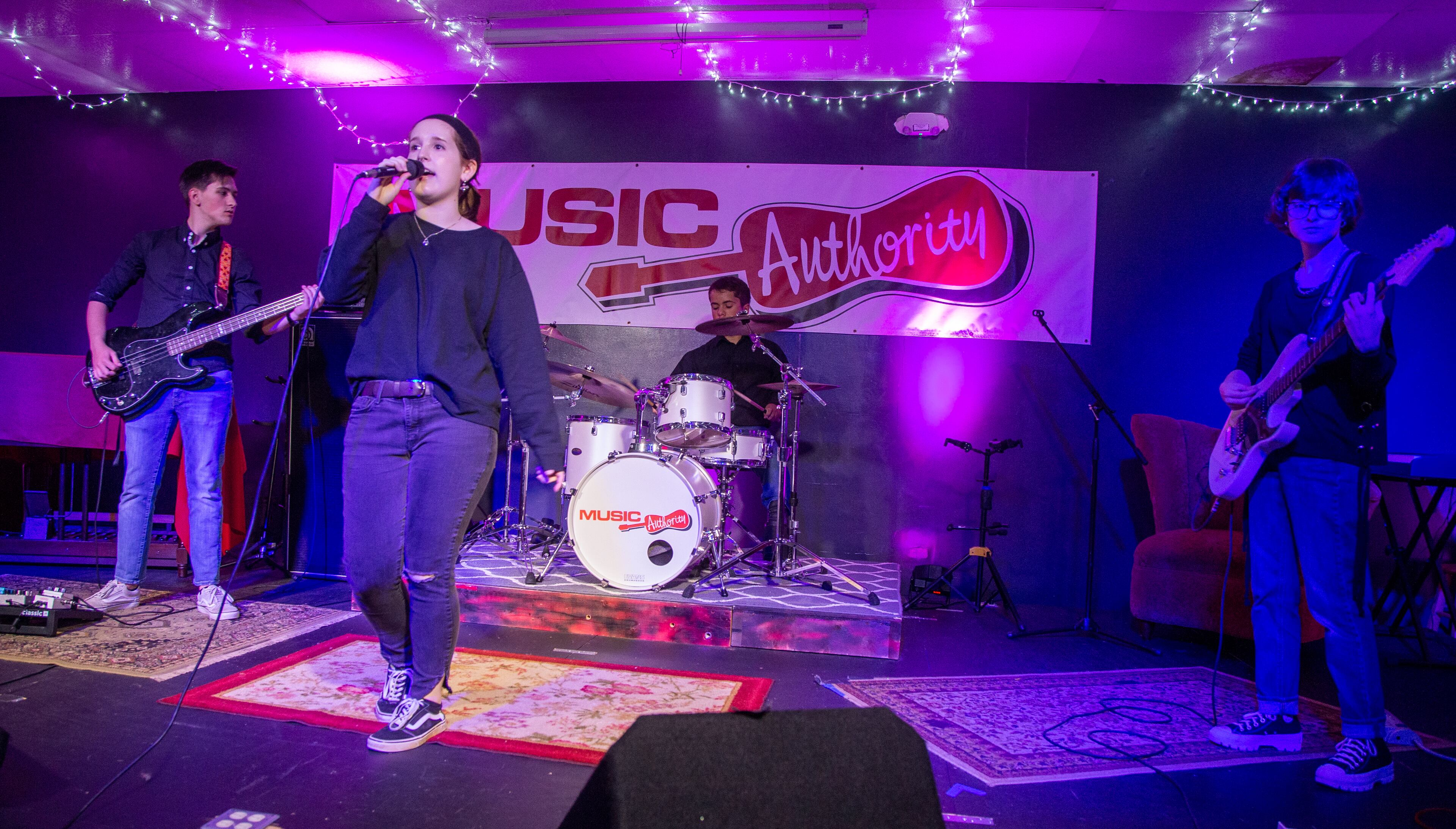 Jackson Warren (from left) practices with fellow Eclipse band members Samantha Clark, Dominic Perez and Tara McBride at the Music Authority in Cumming. PHIL SKINNER FOR THE ATLANTA JOURNAL-CONSTITUTION.