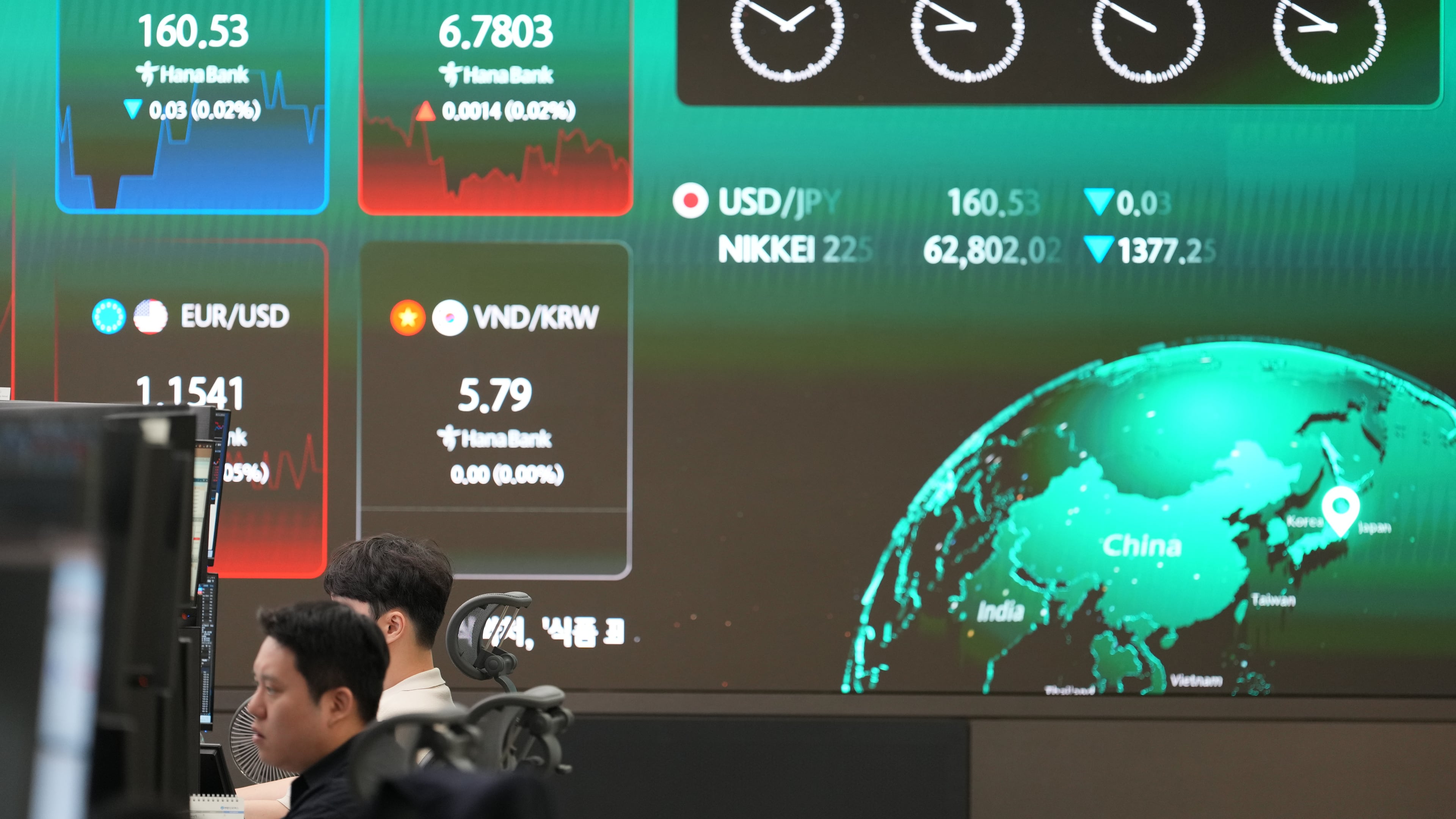 A screen shows foreign exchange rates at a dealing room of Hana Bank in Seoul, South Korea, Thursday, June 11, 2026. (AP Photo/Lee Jin-man)