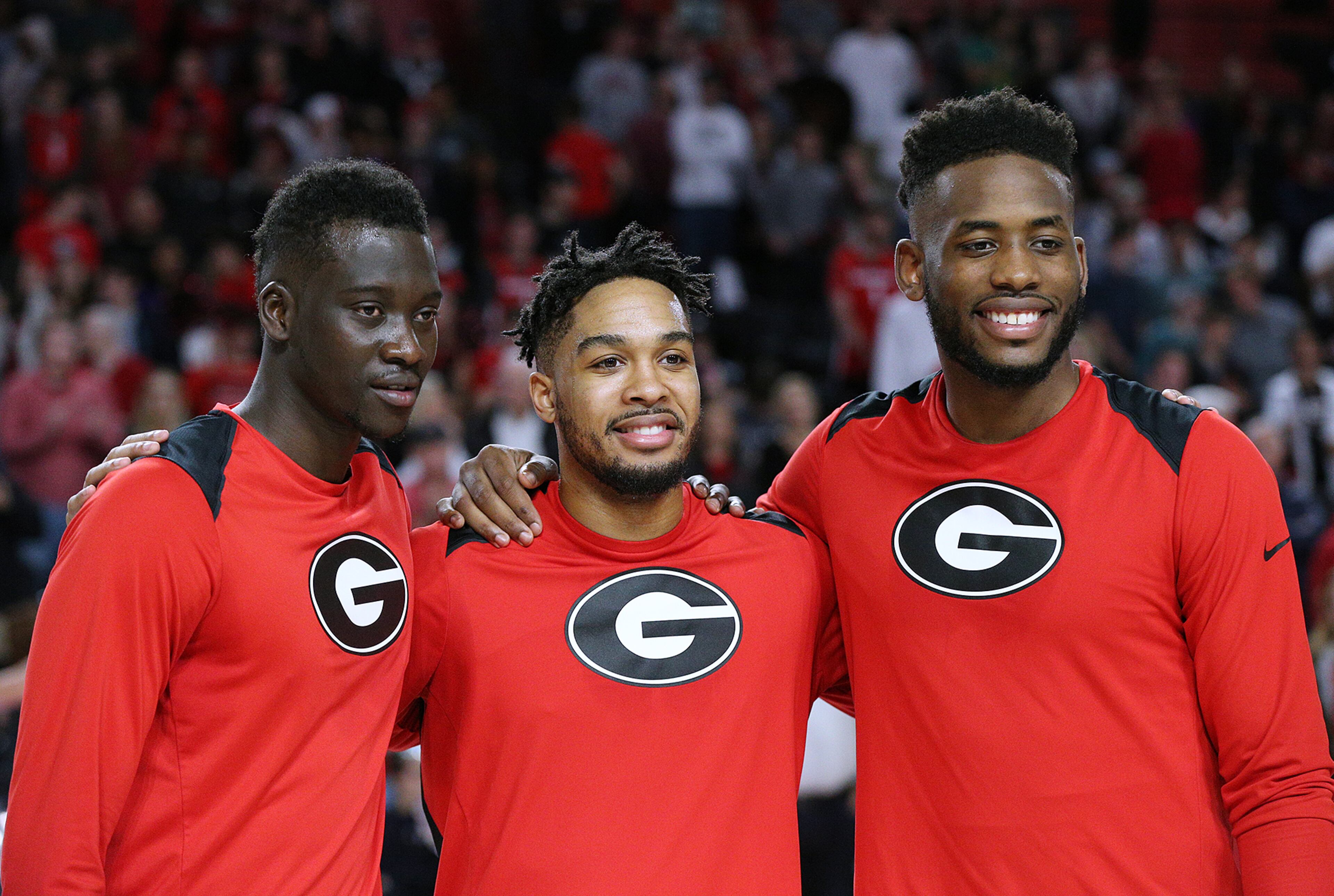 Feb 28, 2018 Athens: Georgia seniors Pape Diatta (from left), Juwan Parker, and Yante Maten are honored in the final home game of the season against Texas A&M in a NCAA college basketball game on Wednesday, Feb 28, 2018, in Athens. Curtis Compton/ccompton@ajc.com