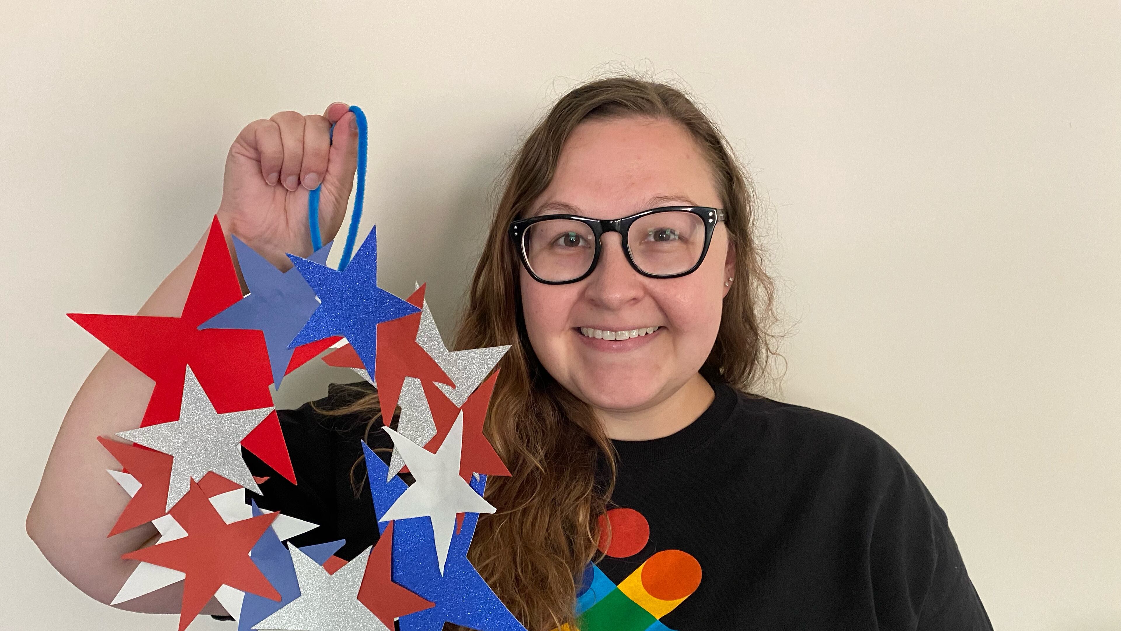 Allyson Eads shares her love of crafting with children at South Cobb Regional Library in Mableton. July 4th wreath craft kits can be picked up from June 28 - July 3.