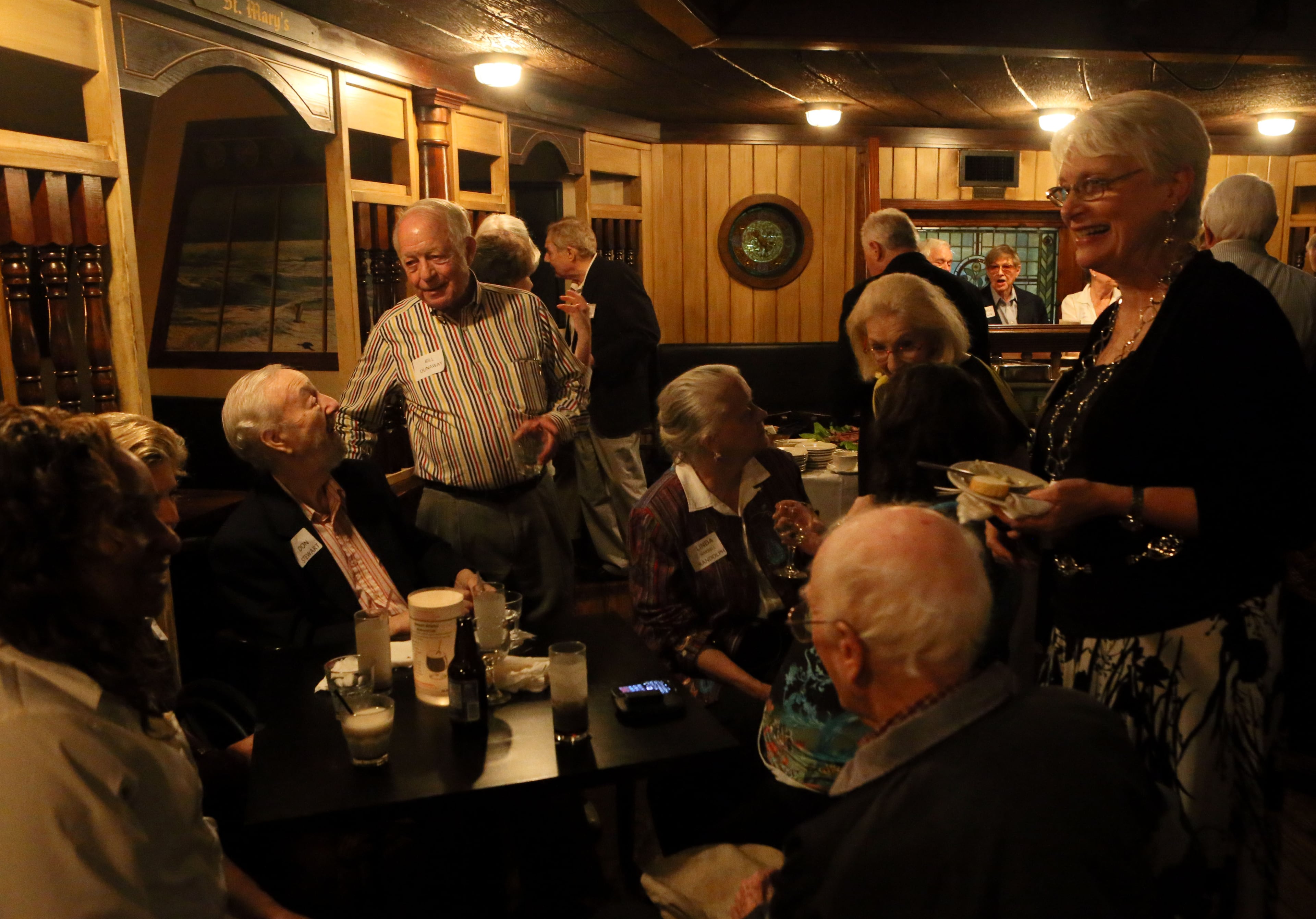 The crowd mingles during a private party at Dante's Down the Hatch restaurant in Atlanta in June 2013. Owner Dante Stephenson hosted the event for past members of the Atlanta Ski Club (Dante is a former president), Young Republicans and former Colonial Homes residents.