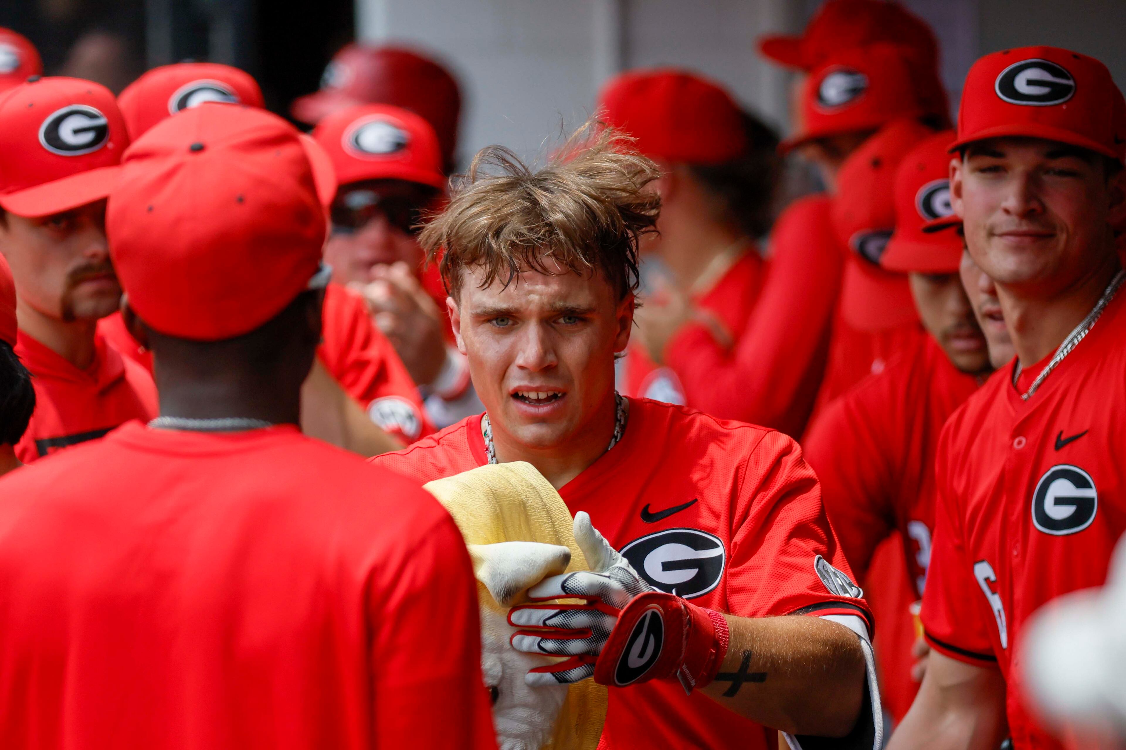 Georgia infielder Slate Alford (44) is congratulated by teammates after his two-run home run during the second inning against Oklahoma State in their NCAA Regional game at Foley Field, Sunday, June 1, 2025, in Athens, Ga.
(Miguel Martinez/ AJC)