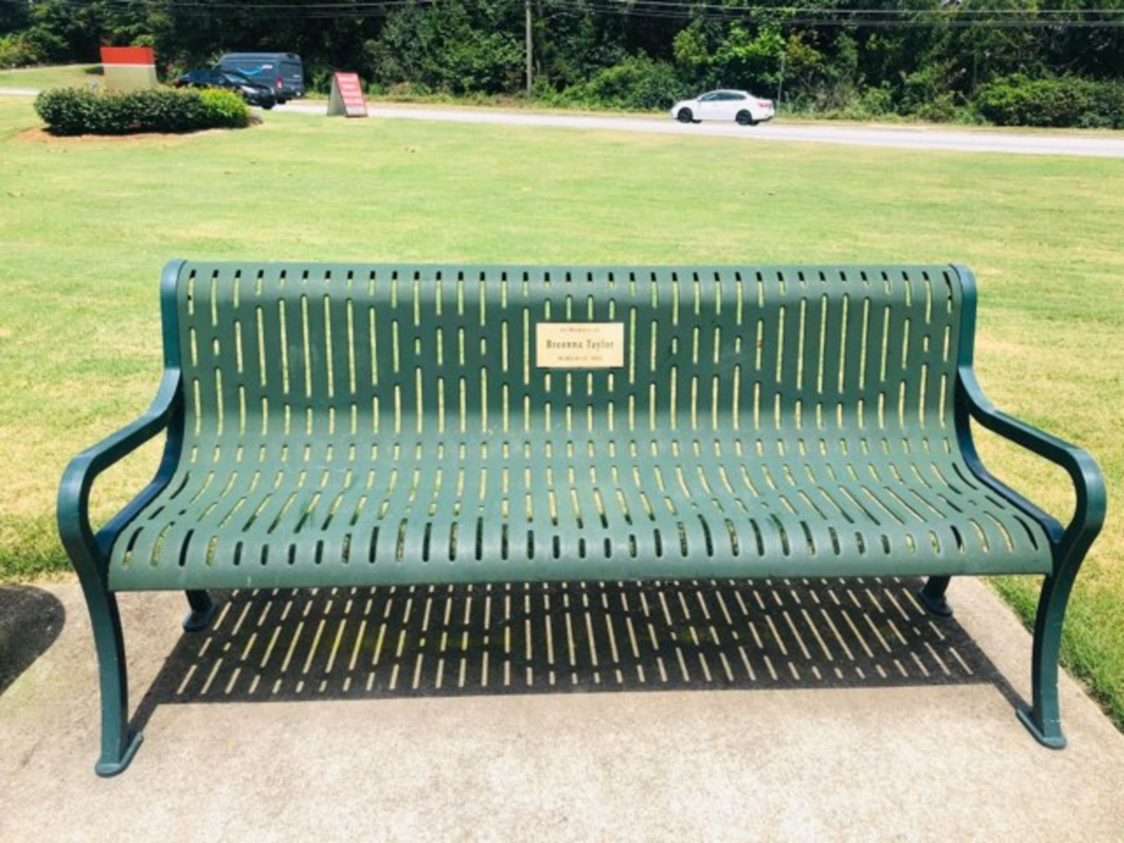 A Smyrna couple has dedicated three benches with plaques honor Ahmaud Arbery, Breonna Taylor and George Floyd. Credit: Damon Willis