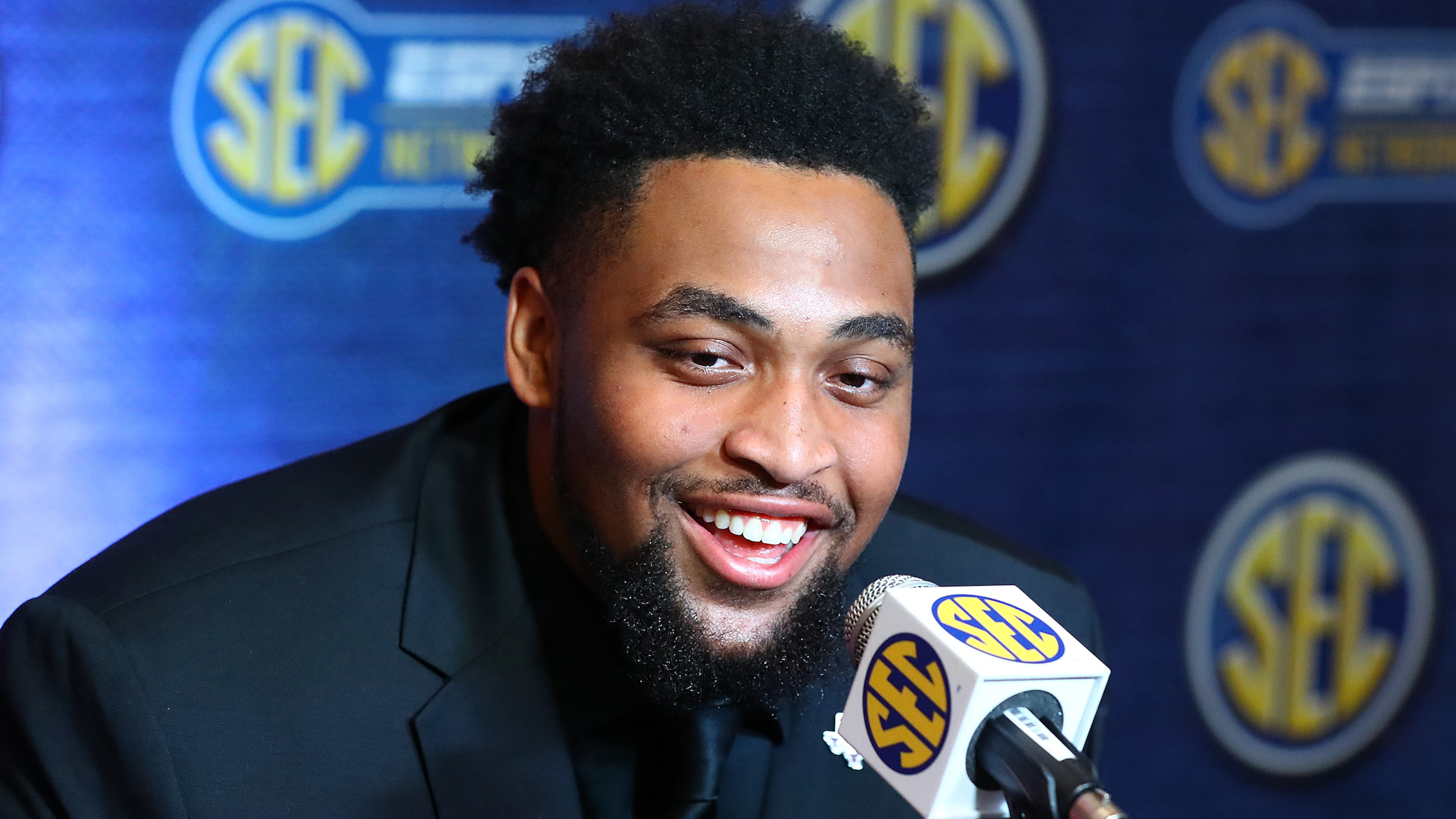 Offensive lineman Layden Robinson, who answered a question during SEC media days on July 21, 2022, in Atlanta, was a three-year starter at Texas A&M. (Curtis Compton/AJC)