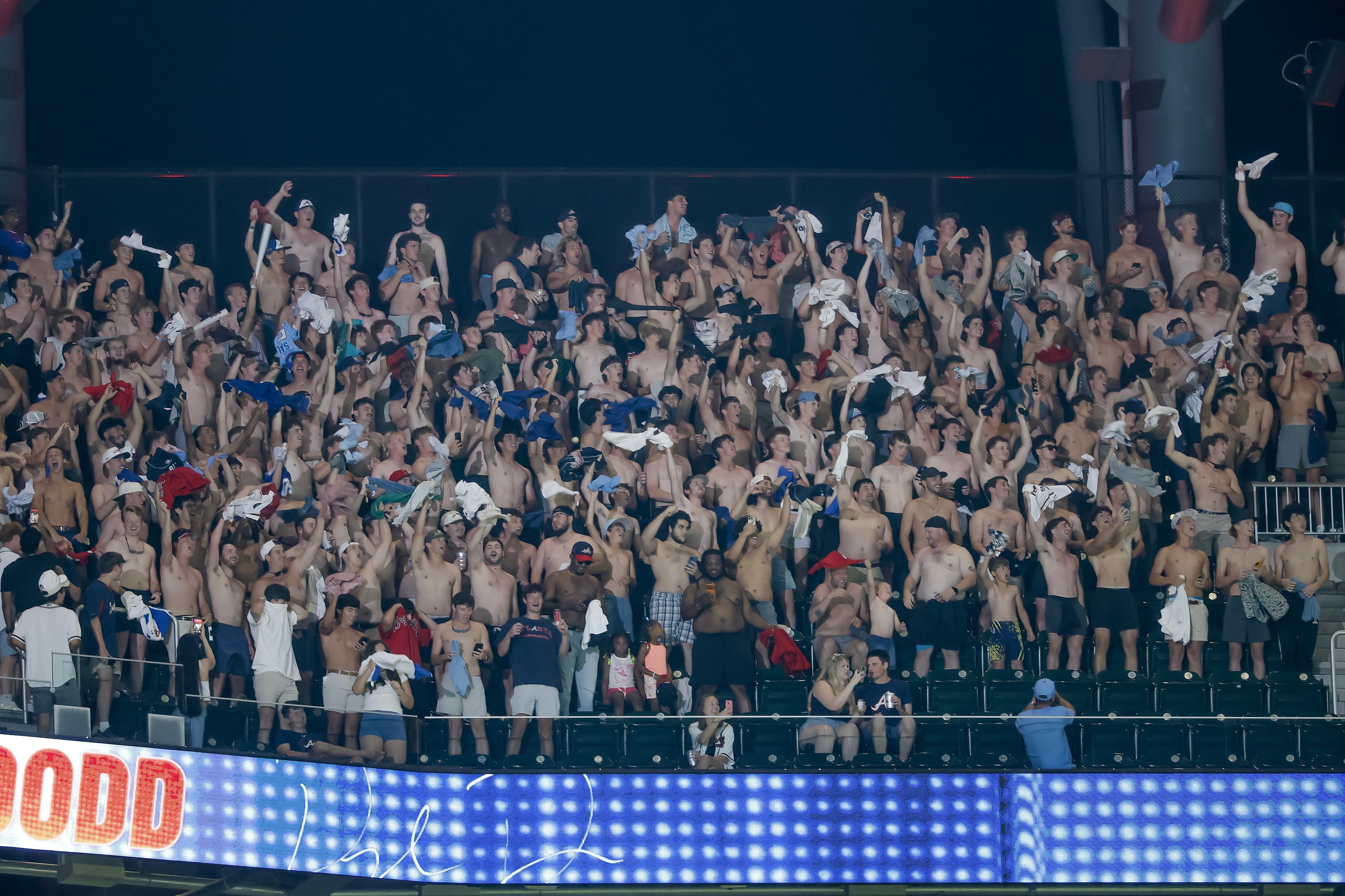 It was a “tarps off” kind of vibe in the upper deck of Truist Park on Thursday night. (Erik S. Lesser/AP)