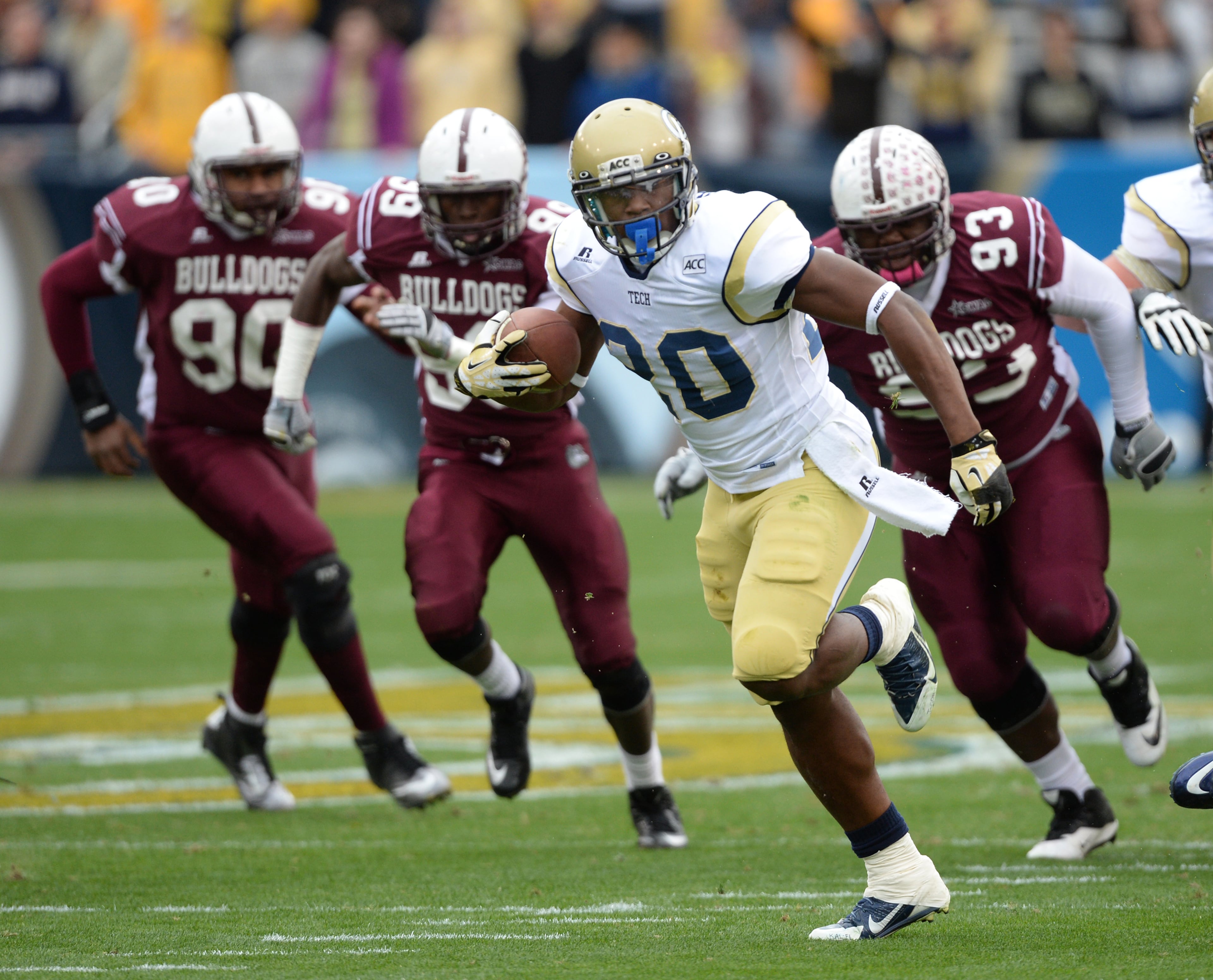 Georgia Tech's David Sims runs for a first down during the Georgia Tech vs. Alabama A&M football game in Bobby Dodd Stadium. Georgia Tech won the game 66 to 7.