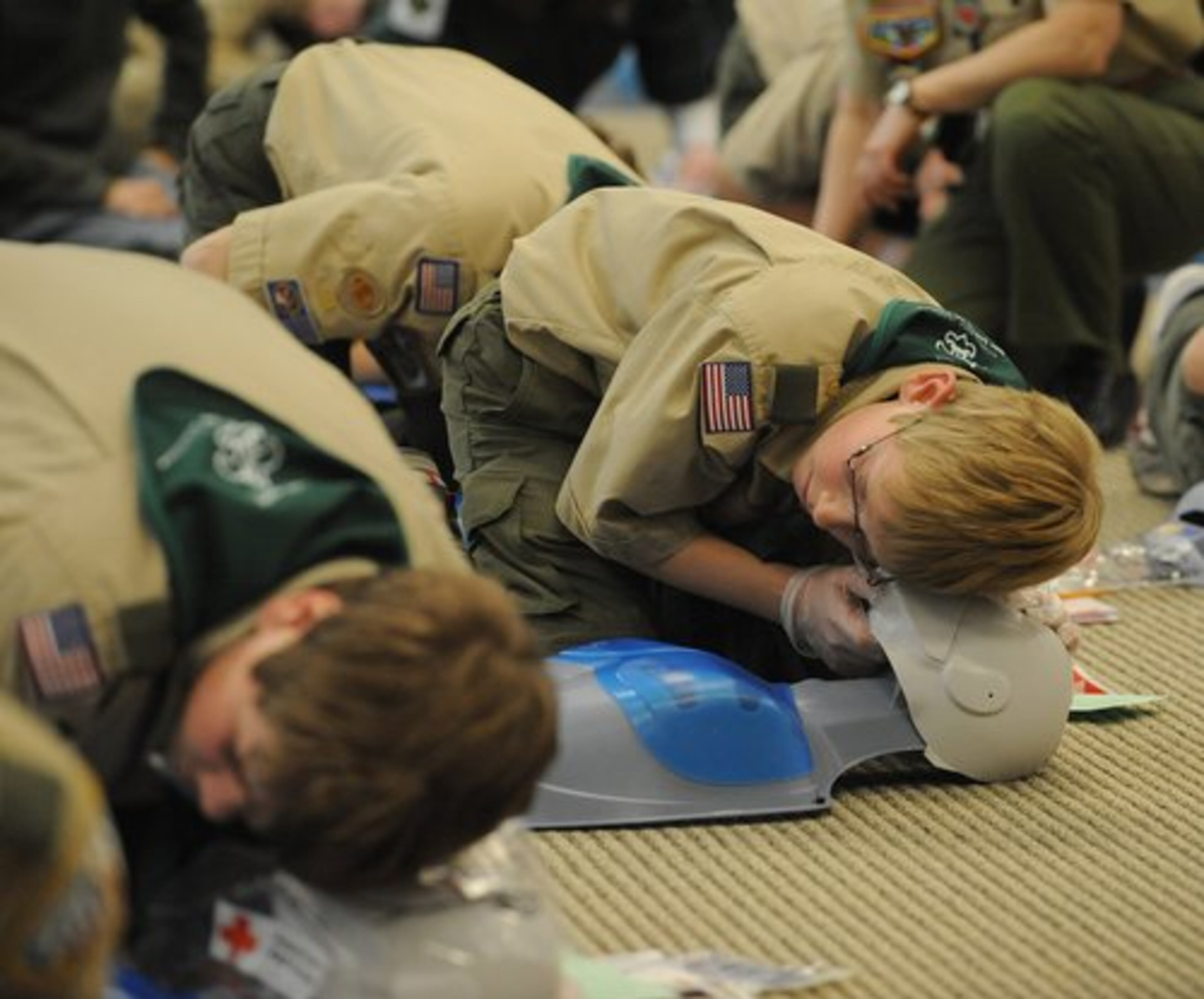 Dillon Sprague, 12, Milton, listens from breathing sounds during a Cardio Pulmonary Resuscitation (CPR) class on Scout CPR Saturday at the Boy Scouts of America's Atlanta Area Council Office on Saturday, March 6, 2010. The classes were taught by the American Red Cross and certified Scout leaders.