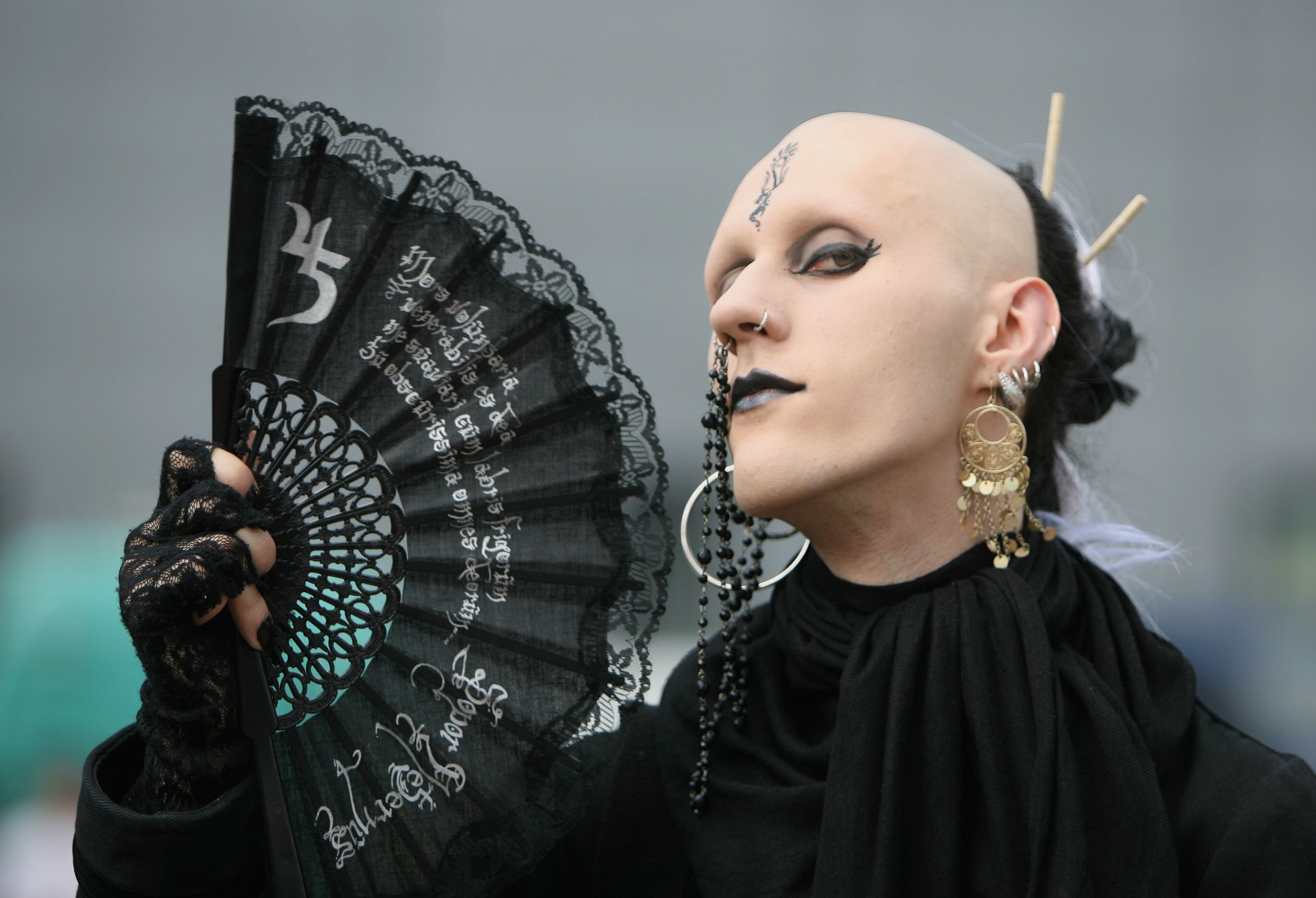 LEIPZIG, GERMANY - MAY 25: Participants of the annual Wave Gothic Festival roam the camp site of the four day music festival showing off their costumes and make up on Friday, 25 May 2007 in Leipzig, Germany. The festival, which started out in 1992 with a small line up of only 10 bands, has grown to span four days and dozens of bands playing outside and inside venues across Leipzig. (Photo by Katja Buchholz/Getty Images)