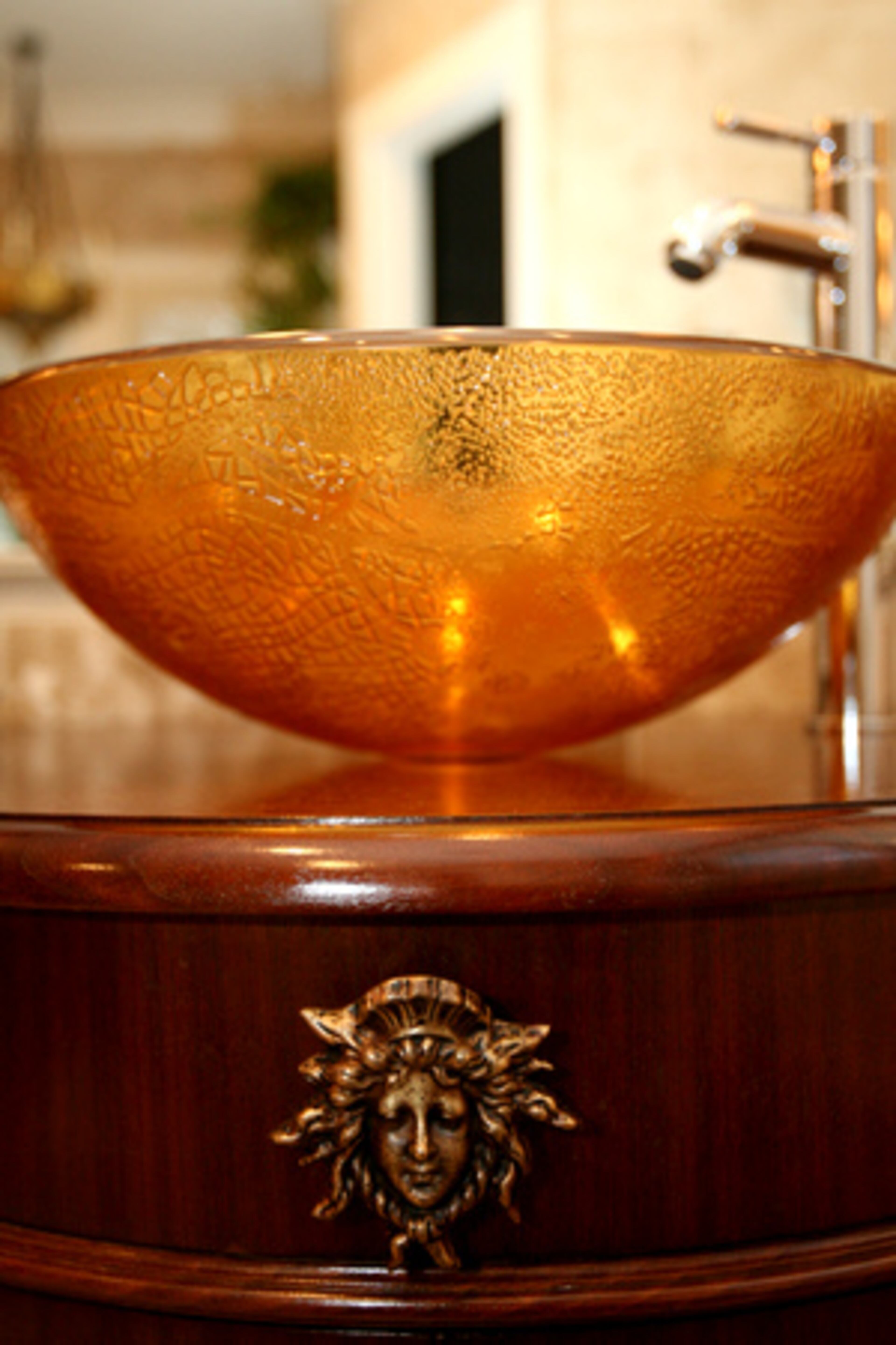 The knob on the master bath sink basin comes from Knob Appeal, a side business owned by Musso and partner Jenni Ling. They design and manufacture specialty knobs for doors and cabinets.