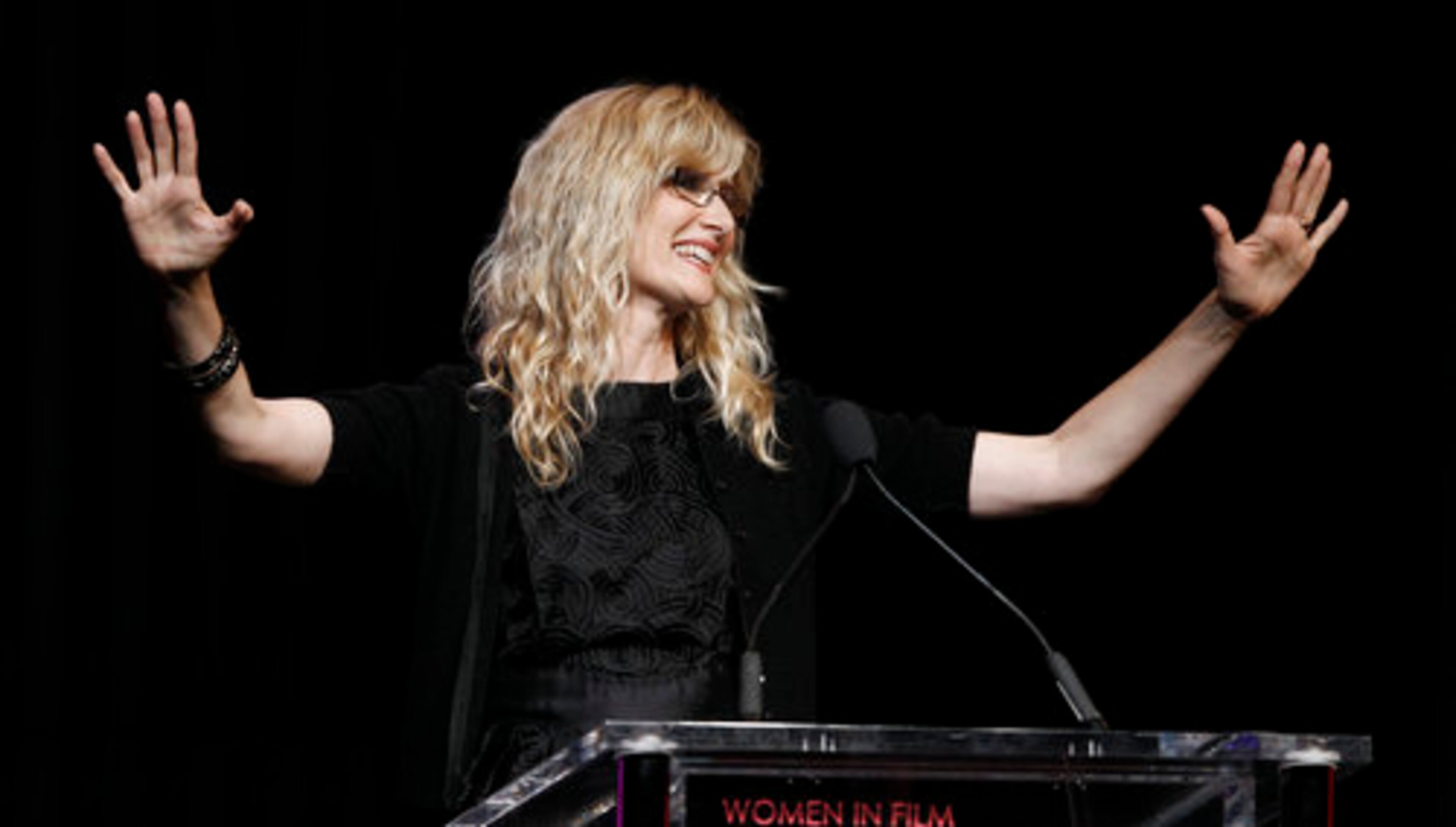 Laura Dern gets everyone's attention before presenting the Lucy Award for Excellence in Television.