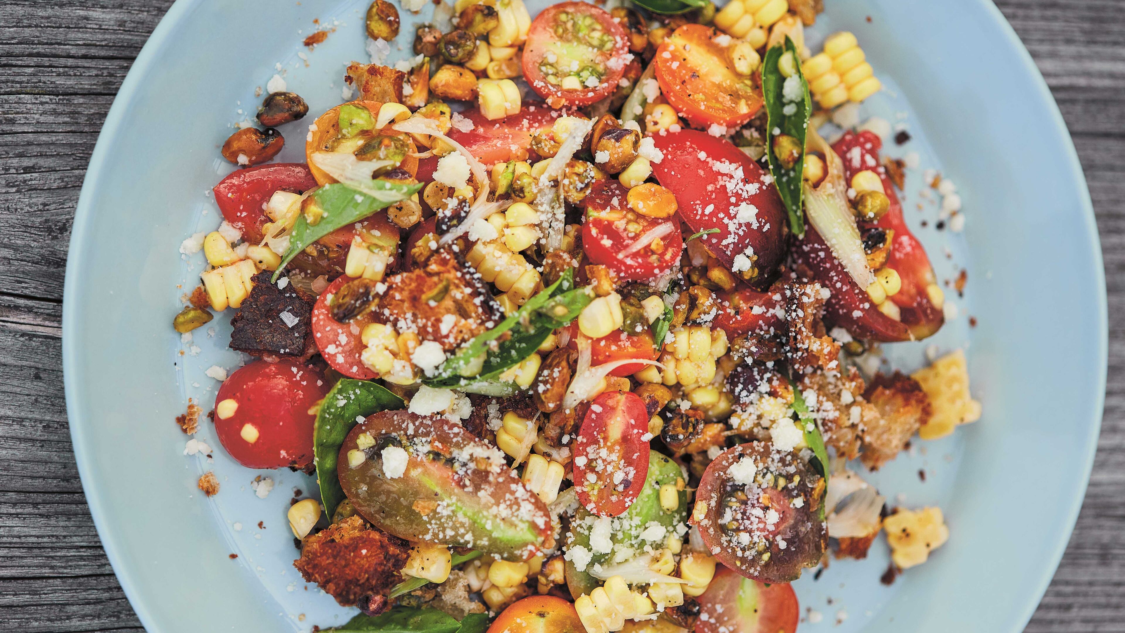 Corn and Tomato Salad with Torn Croutons from "Six Seasons" by Joshua McFadden (Artisan Books, 2017). Contributed by Laura Dart and A.J. Meeker