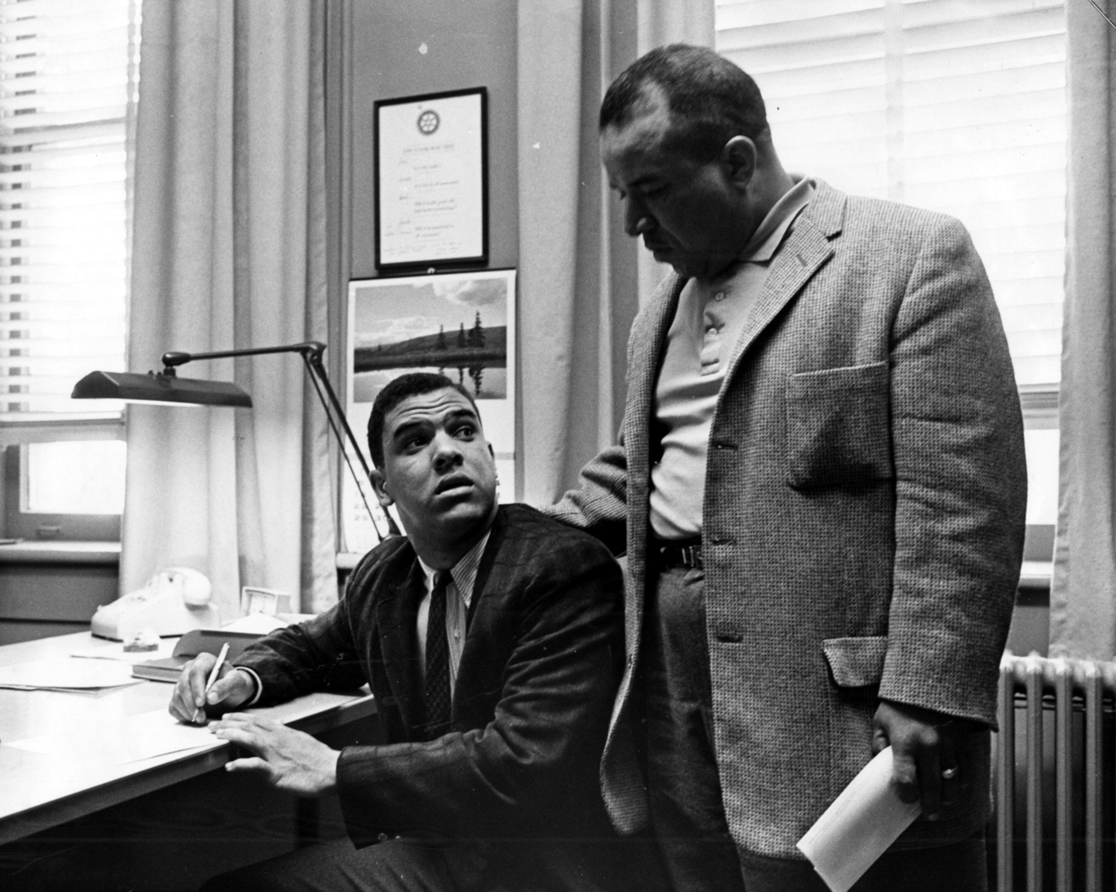 Hamilton E. Holmes (seated) with his father Alfred Holmes on Jan. 9, 1961. Hamilton Holmes was about to be one of the first African Americans to enter the University of Georgia.