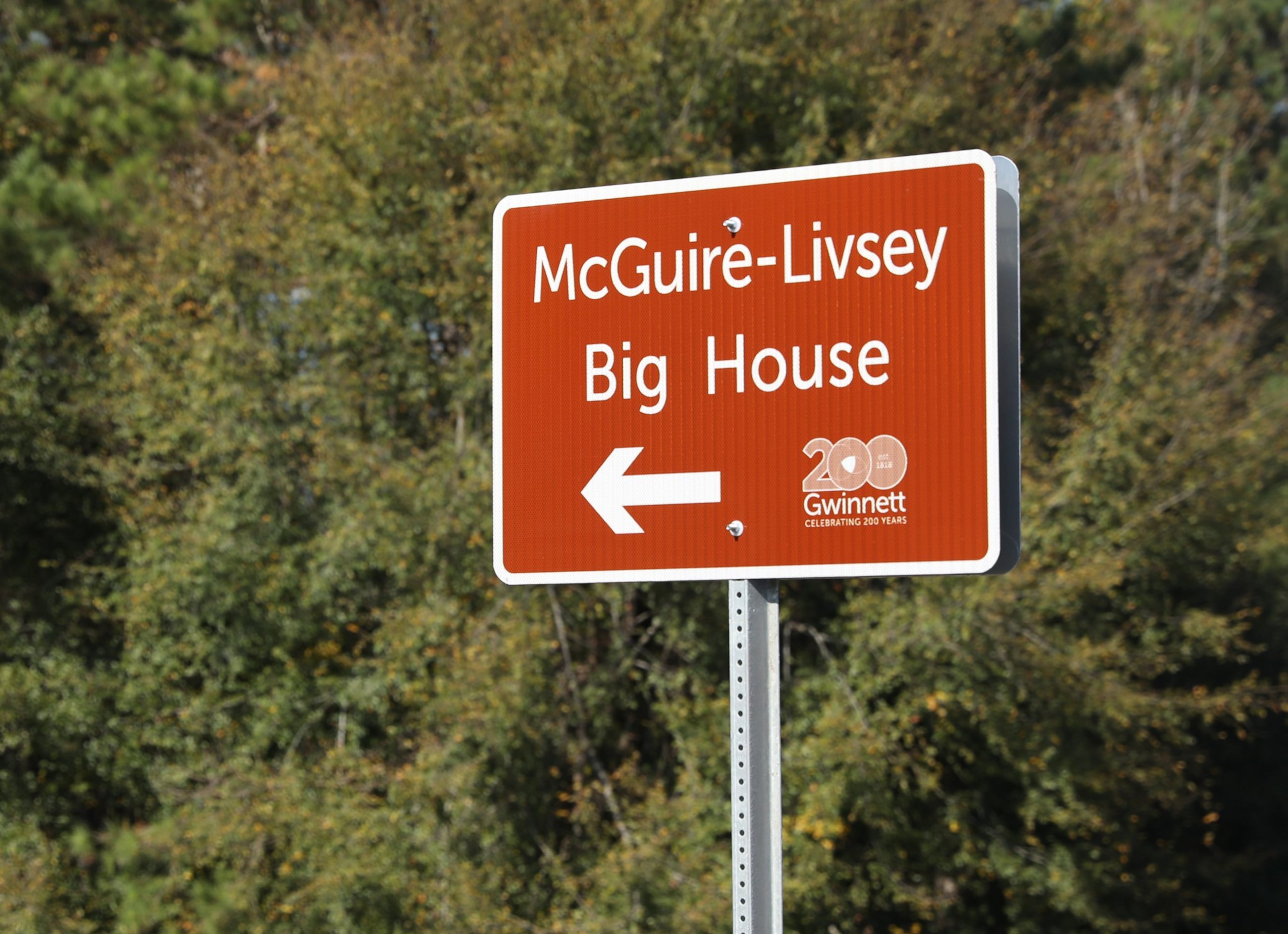 October 31, 2018 - Snellville, Ga: A sign for the Maguire-Livsey Big Home is shown Wednesday, October 31, 2018, in Snellville, Ga. This home also known as the “Big House” was recently purchased by Gwinnett County for renovation and preservation from descendants of the original black owners. (JASON GETZ/SPECIAL TO THE AJC)