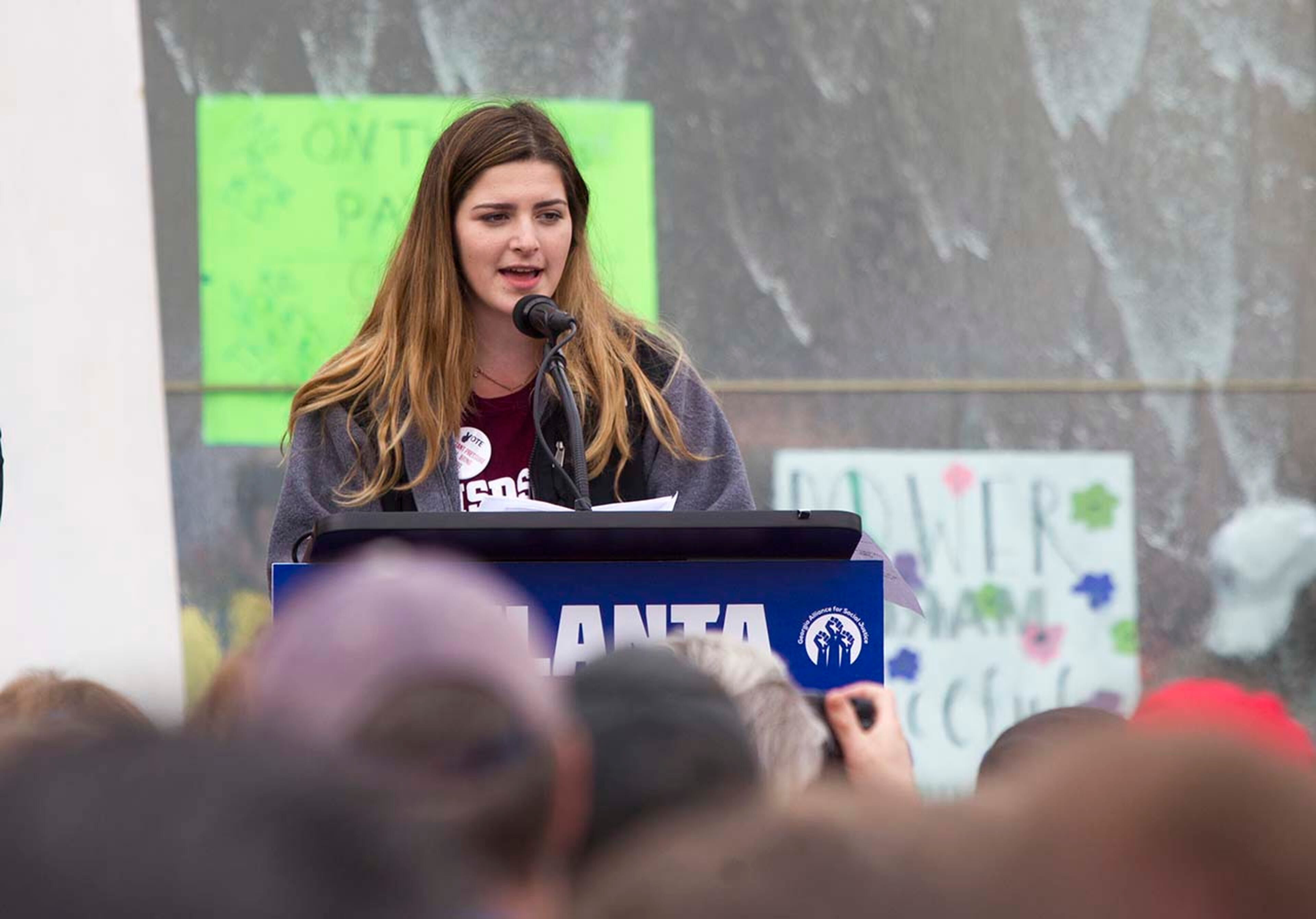 Parkland shooting survivor Carly Novell speaks during the March for our Lives event in Atlanta, Georgia, on Saturday, March 24, 2018. (REANN HUBER/REANN.HUBER@AJC.COM)